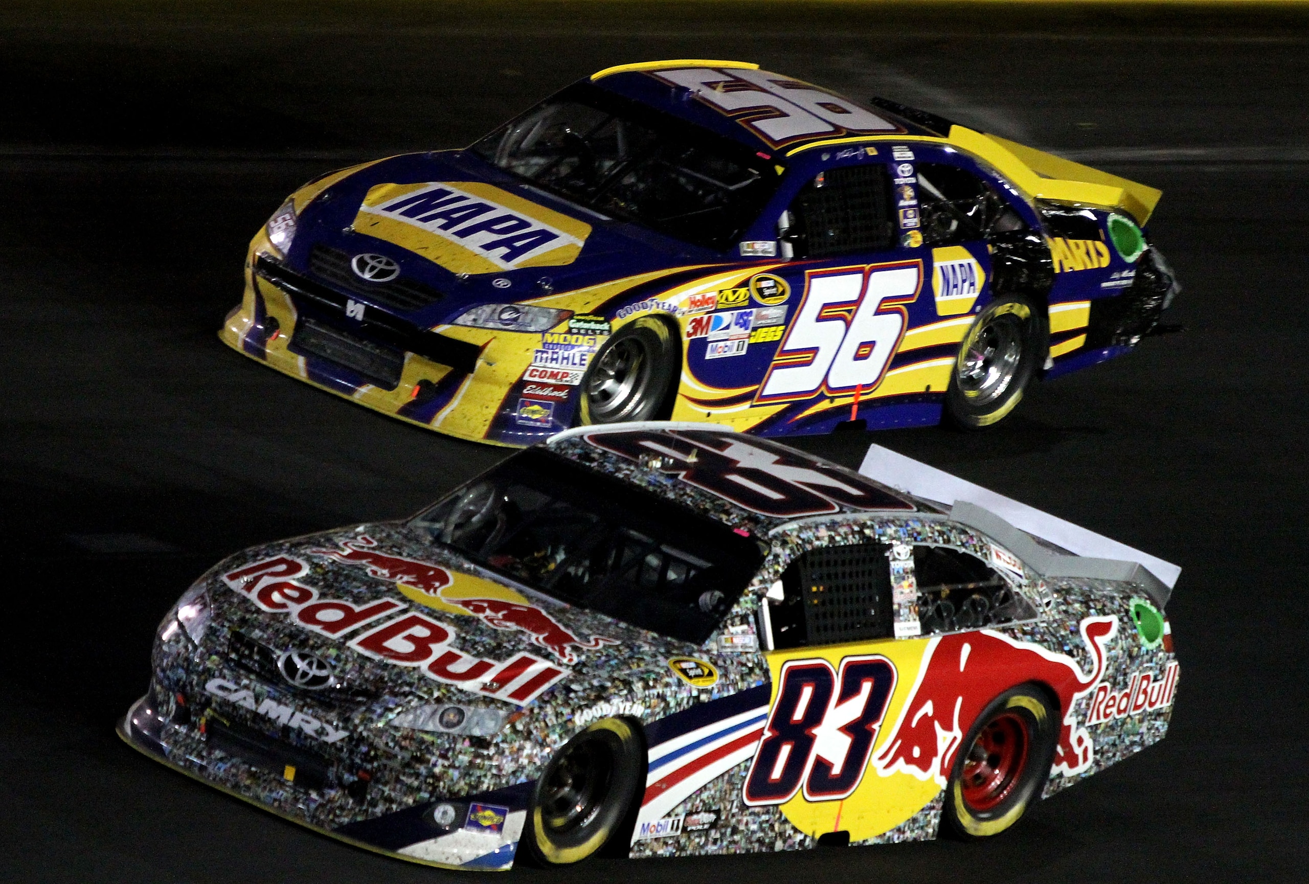 CONCORD, NC - MAY 29: Brian Vickers, driver of the #83 Red Bull Toyota, races side by side with Martin Truex Jr., driver of the #56 NAPA Auto Parts Toyota, during the NASCAR Sprint Cup Series Coca-Cola 600 at Charlotte Motor Speedway on May 29, 2011 in C CONCORD, NC - MAY 29: Brian Vickers, driver of the #83 Red Bull Toyota, races side by side with Martin Truex Jr., driver of the #56 NAPA Auto Parts Toyota, during the NASCAR Sprint Cup Series Coca-Cola 600 at Charlotte Motor Speedway on May 29, 2011 in C