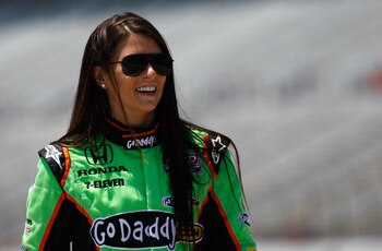 FORT WORTH, TX - JUNE 10:  Danica Patrick, driver of the #7 GoDaddy.com Dallara Honda, walks on pit road prior to practice for the IZOD IndyCar Series Firestone Twin 275's at Texas Motor Speedway on June 10, 2011 in Fort Worth, Texas.  (Photo by Chris Gra