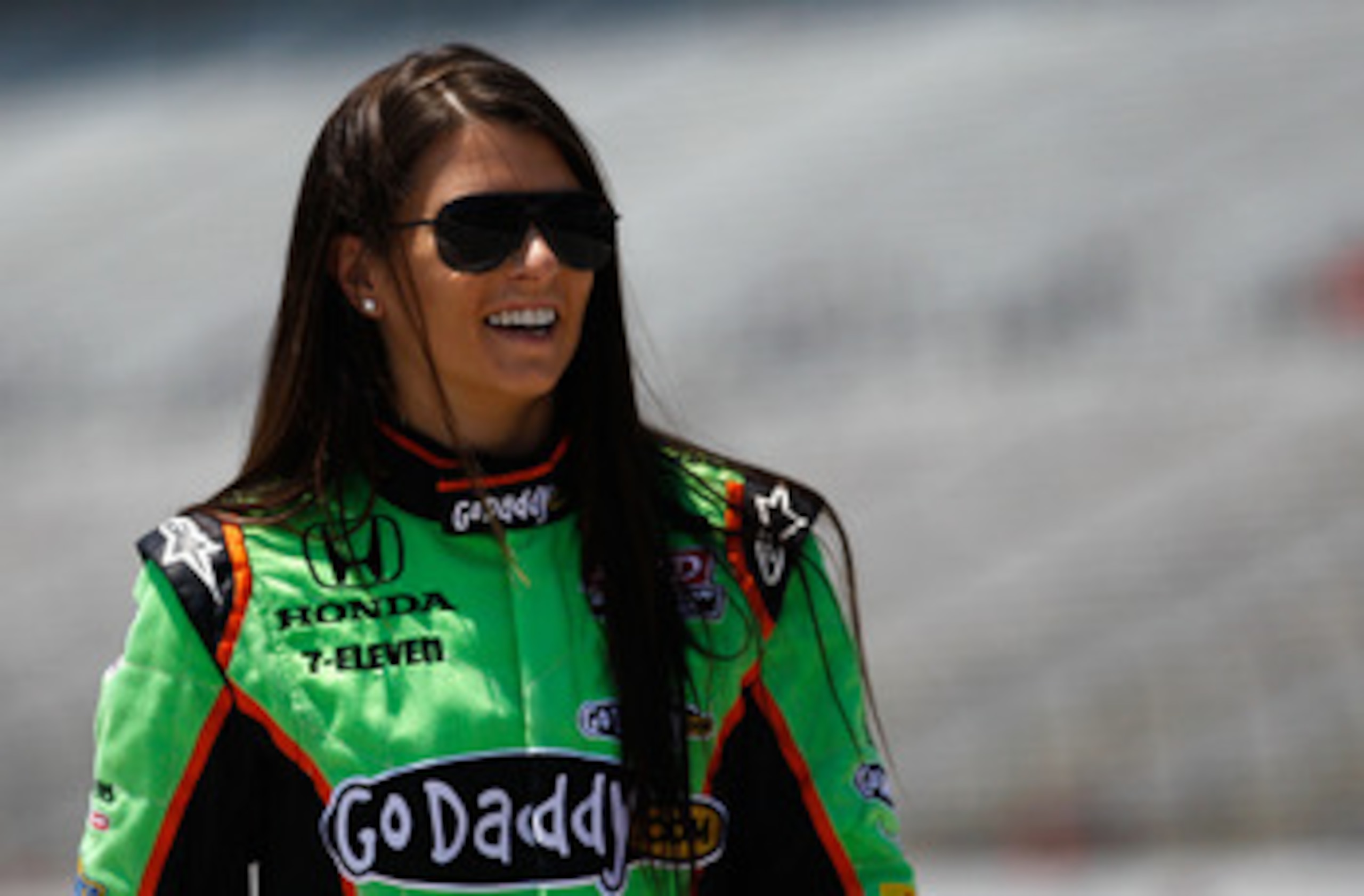 FORT WORTH, TX - JUNE 10:  Danica Patrick, driver of the #7 GoDaddy.com Dallara Honda, walks on pit road prior to practice for the IZOD IndyCar Series Firestone Twin 275's at Texas Motor Speedway on June 10, 2011 in Fort Worth, Texas.  (Photo by Chris Gra