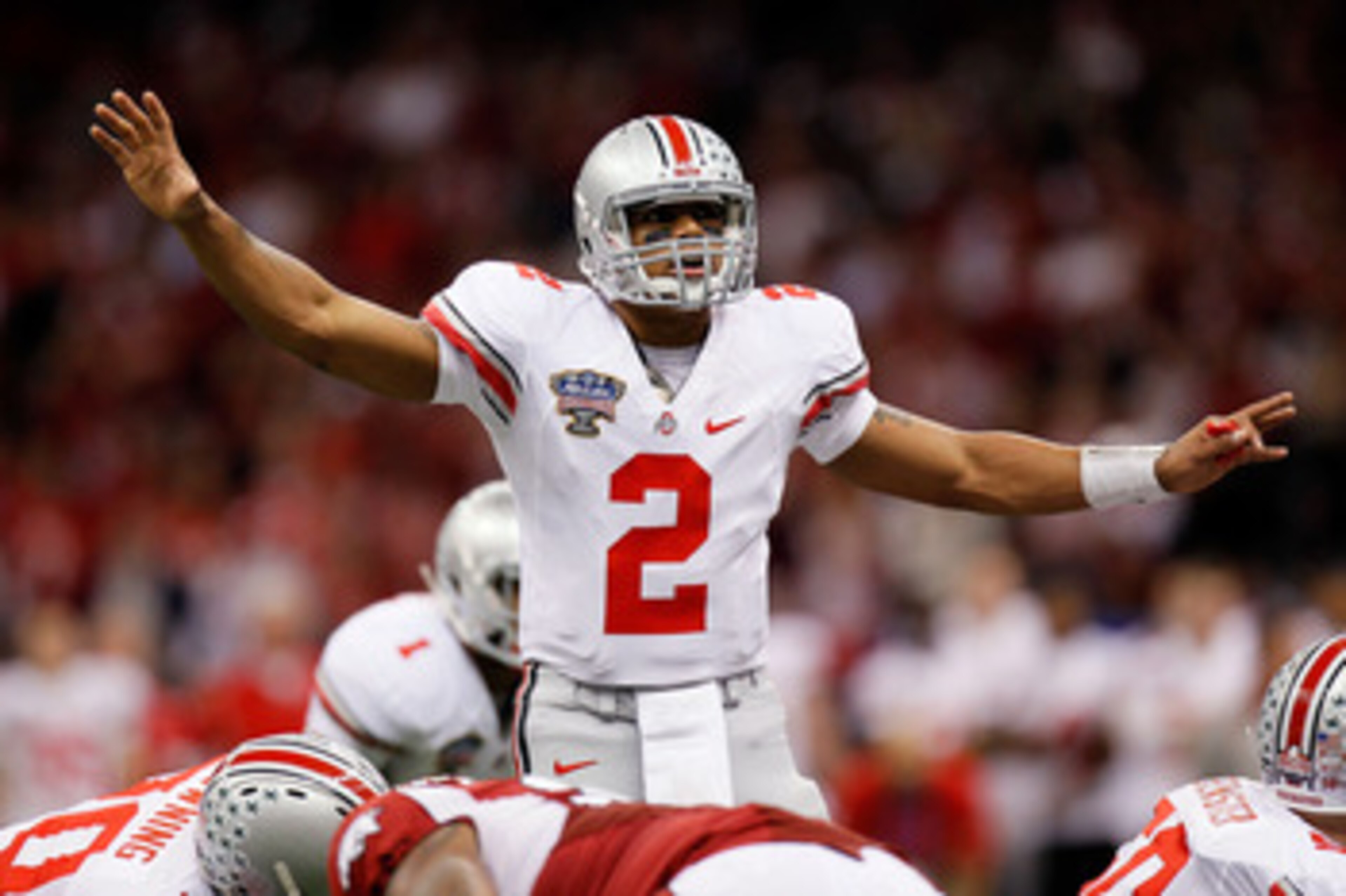 NEW ORLEANS, LA - JANUARY 04: Quarterback Terrelle Pryor #2 of the Ohio State Buckeyes calls out from under center against the Arkansas Razorbacks during the Allstate Sugar Bowl at the Louisiana Superdome on January 4, 2011 in New Orleans, Louisiana. (P NEW ORLEANS, LA - JANUARY 04: Quarterback Terrelle Pryor #2 of the Ohio State Buckeyes calls out from under center against the Arkansas Razorbacks during the Allstate Sugar Bowl at the Louisiana Superdome on January 4, 2011 in New Orleans, Louisiana. (P