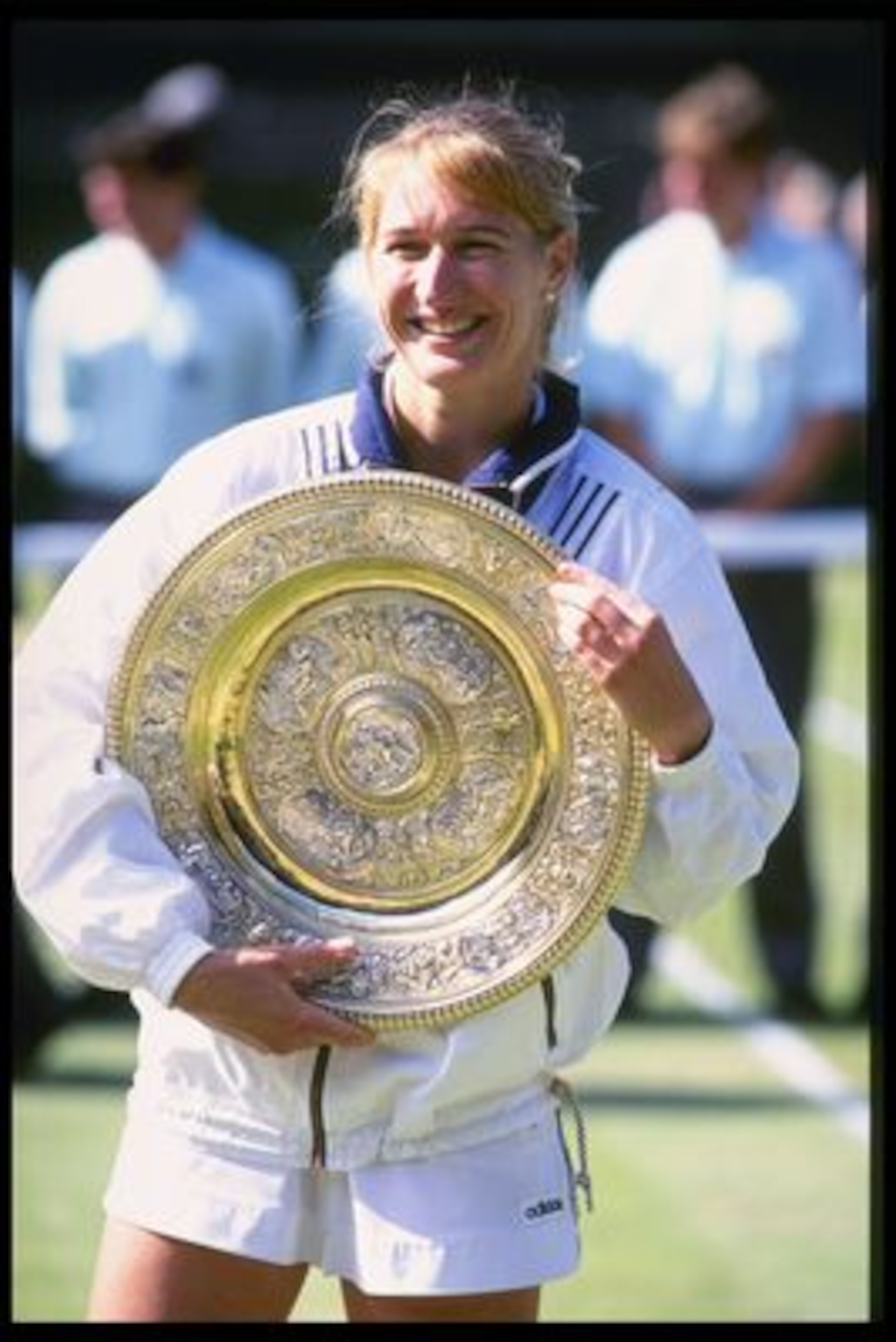 6 Jul 1996:  Steffi Graf of Germany once again holds the womens singles trophy after her straight sets victory over Arantxa Sanchez Vicario of Spain during the Wimbledon tennis championships at the all England Club in London, England.Mandatory Credit: Cli