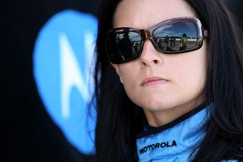 WATKINS GLEN, NY - JULY 05:  Danica Patrick driver of the #7  Motorola Andretti Green Racing Dallara Honda stands in the pits during practice for the IRL IndyCar Series Camping World Grand Prix at The Glen at Watkins Glen International on July 5, 2008 in 