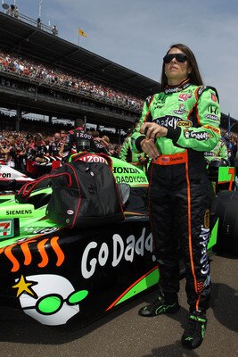 INDIANAPOLIS, IN - MAY 29:  Danica Patrick, driver of the #7 Team GoDaddy Dallara Honda, stands next to her car prior to the IZOD IndyCar Series Indianapolis 500 Mile Race at Indianapolis Motor Speedway on May 29, 2011 in Indianapolis, Indiana.  (Photo by