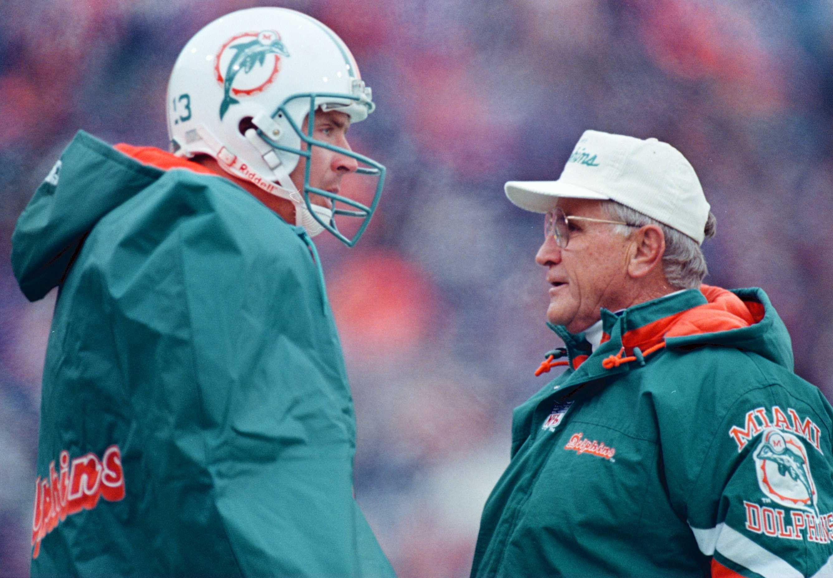 30 DEC 1995:  QUARTERBACK DAN MARINO AND HEAD COACH DON SHULA OF THE MIAMI DOLPHINS CONFER DURING THE THIRD QUARTER OF THEIR AFC WILD CARD LOSS TO THE BUFFALO BILLS AT RICH STADIUM IN ORCHARD PARK, NEW YORK. Mandatory Credit: Al Bello/ALLSPORT