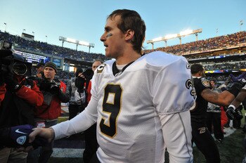BALTIMORE, MD - DECEMBER 19:  Drew Brees #9 of the New Orleans Saints walks off the field after the game against the Baltimore Ravens  at M&T Bank Stadium on December 19, 2010 in Baltimore, Maryland. The Ravens defeated the Saints 30-24. (Photo by Larry F