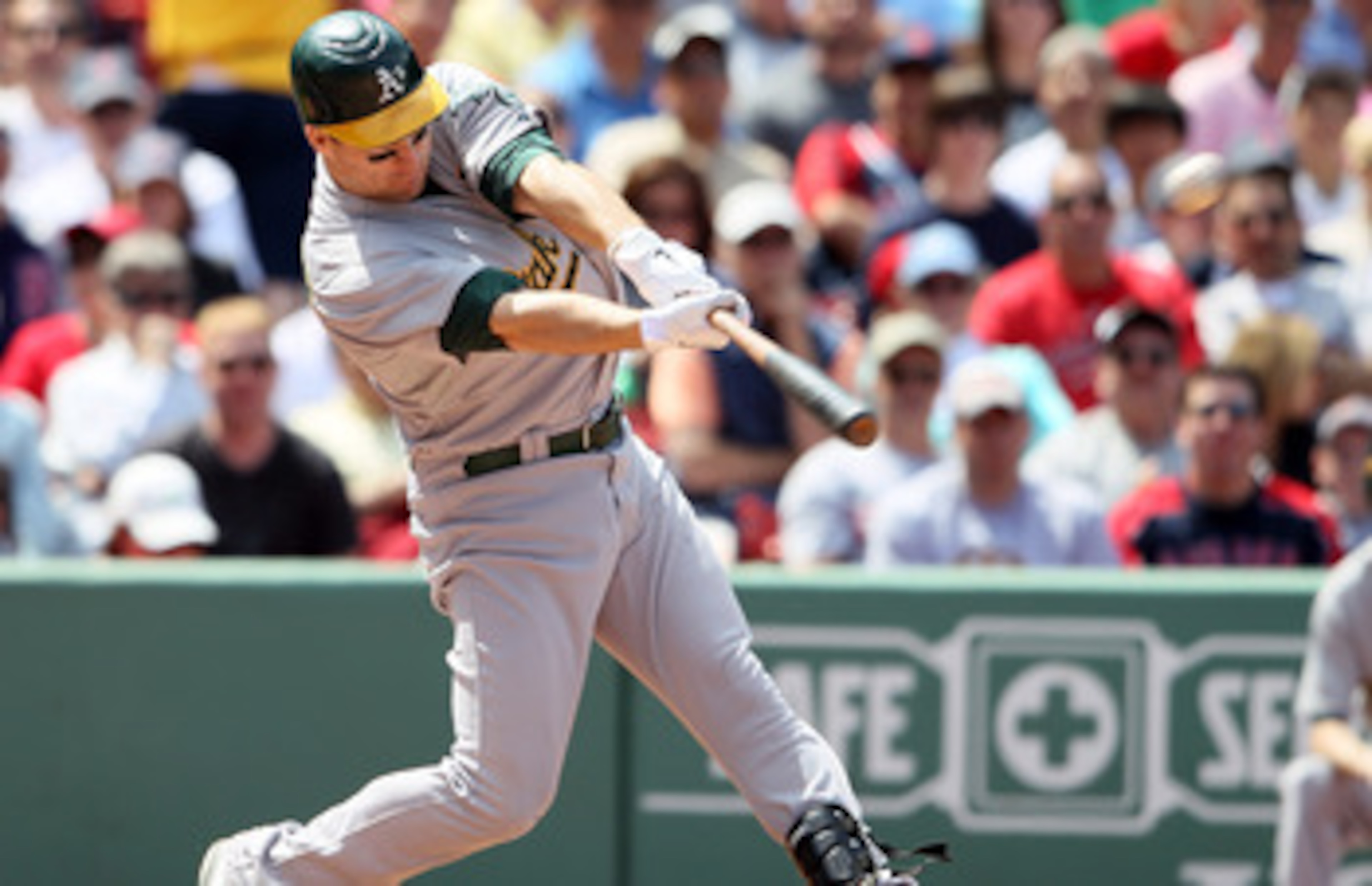 BOSTON, MA - JUNE 04:  Josh Willingham #16 of the Oakland Athletics gets a 2 RBI hit in the sixth inning against the Boston Red Sox on June 4, 2011 at Fenway Park in Boston, Massachusetts.  (Photo by Elsa/Getty Images)