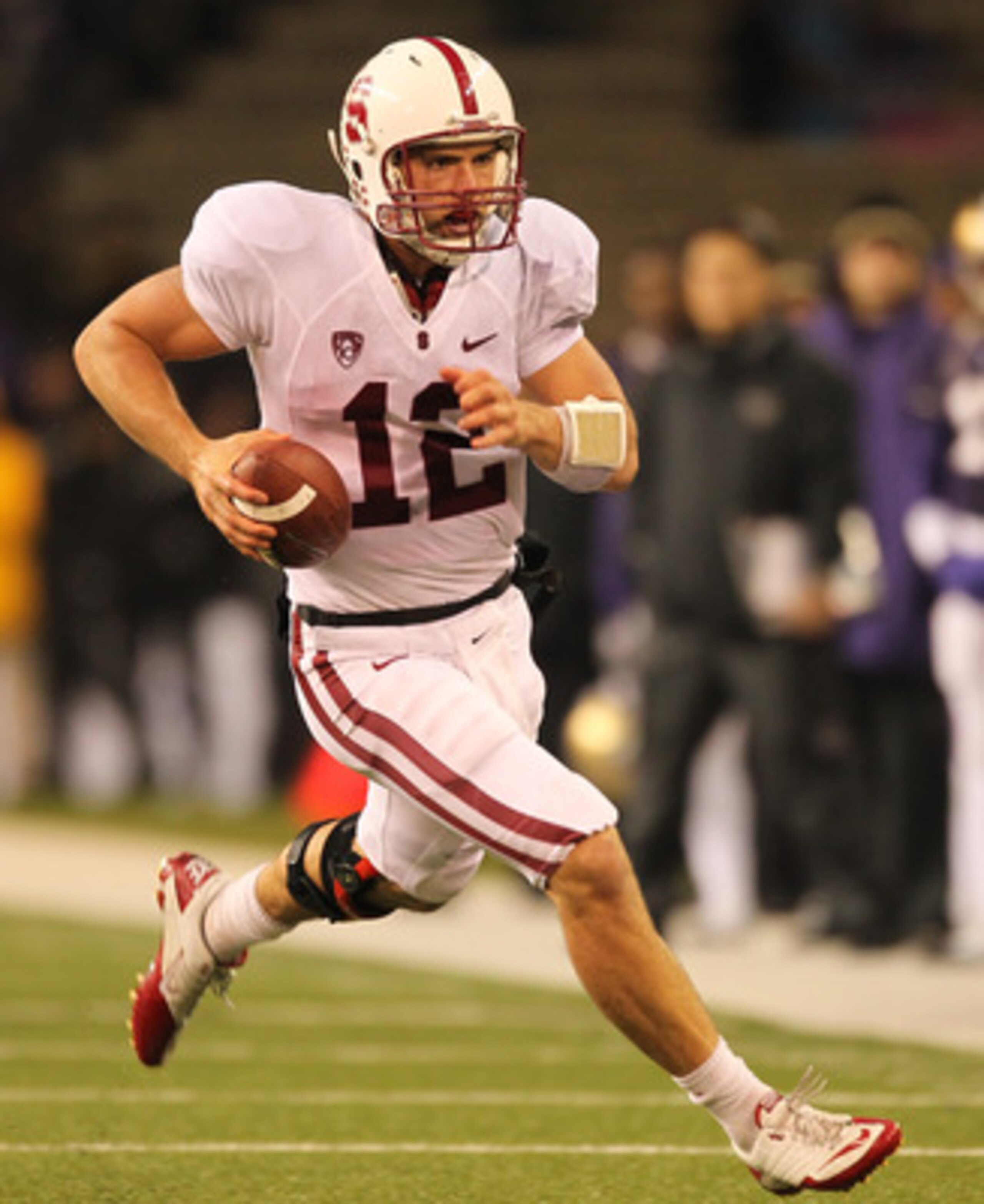 SEATTLE - OCTOBER 30:  Quarterback Andrew Luck #12 of the Stanford Cardinal rushes against the Washington Huskies on October 30, 2010 at Husky Stadium in Seattle, Washington. Stanford won 41-0. (Photo by Otto Greule Jr/Getty Images)