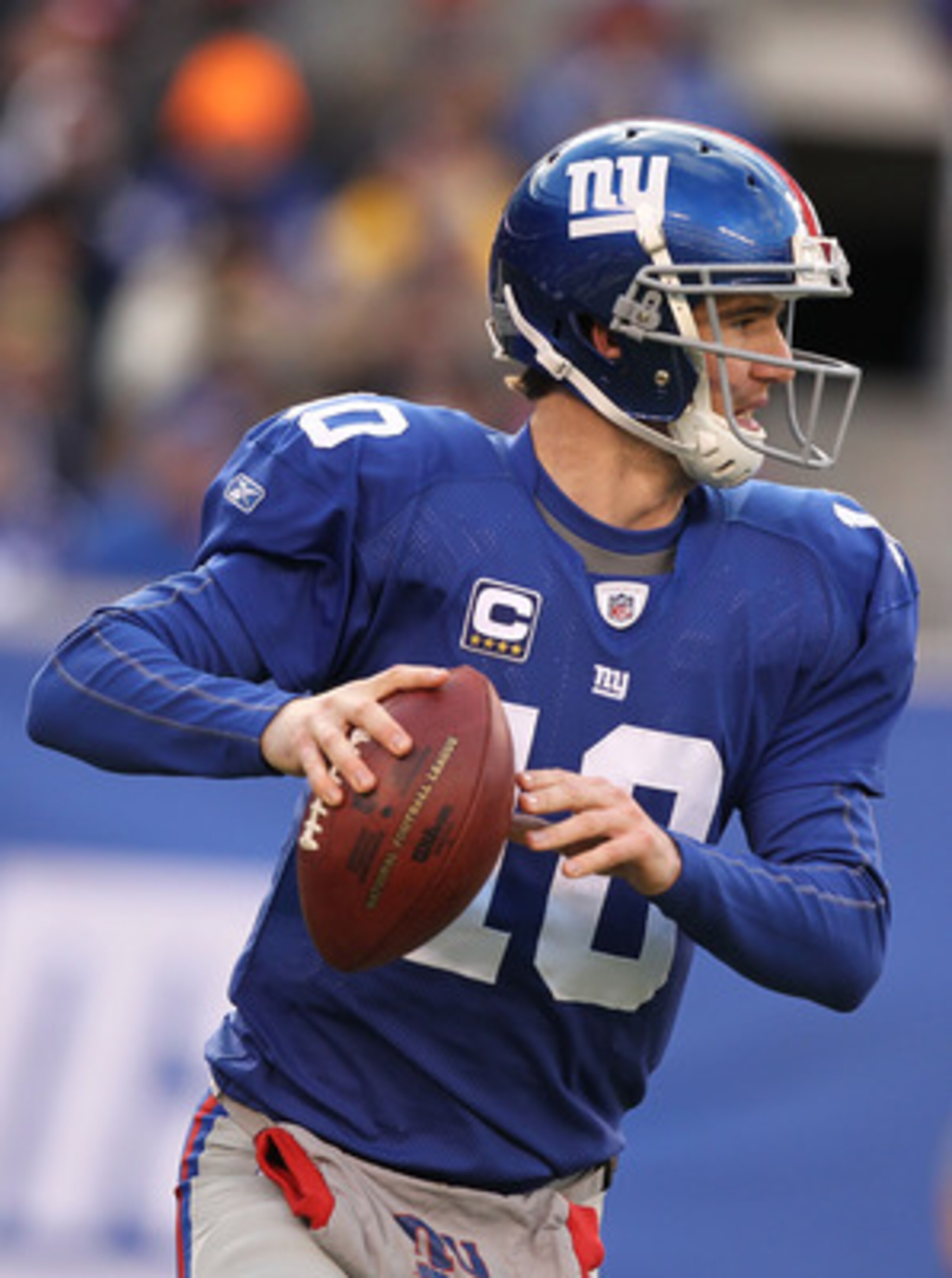 EAST RUTHERFORD, NJ - DECEMBER 05:  Eli Manning #10 of the New York Giants in action against the Washington Redskins during their game on December 5, 2010 at The New Meadowlands Stadium in East Rutherford, New Jersey.  (Photo by Al Bello/Getty Images)