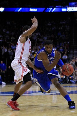 NEWARK, NJ - MARCH 25:  Terrence Jones #3 of the Kentucky Wildcats drives to the basket against David Lighty #23 of the Ohio State Buckeyes during the first half of the east regional semifinal of the 2011 NCAA Men's Basketball Tournament at the Prudential