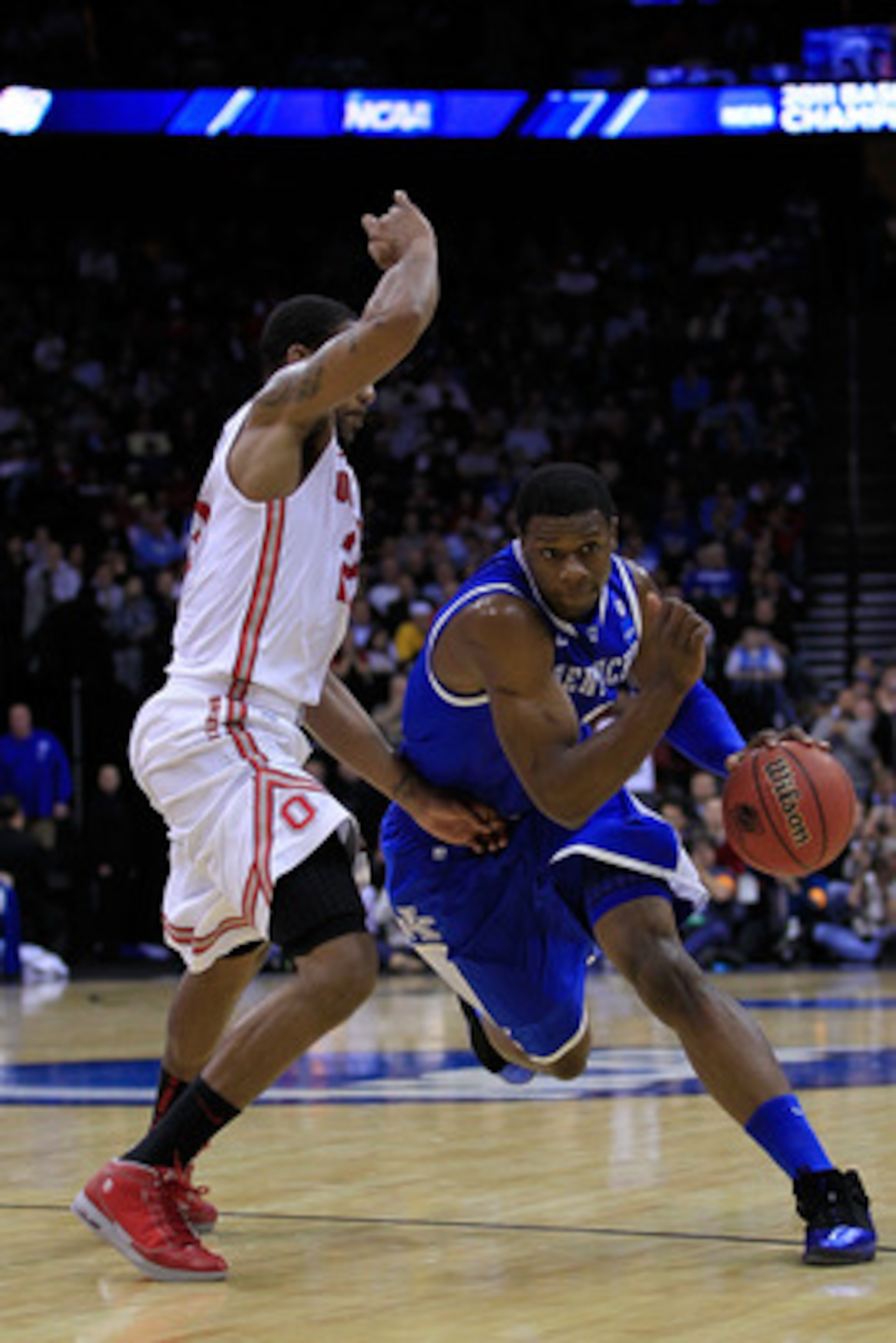 NEWARK, NJ - MARCH 25:  Terrence Jones #3 of the Kentucky Wildcats drives to the basket against David Lighty #23 of the Ohio State Buckeyes during the first half of the east regional semifinal of the 2011 NCAA Men's Basketball Tournament at the Prudential