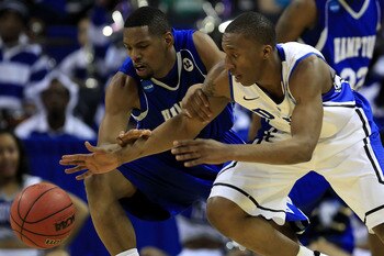 CHARLOTTE, NC - MARCH 18:  Nolan Smith #2 of the Duke Blue Devils and Brandon Tunnell #5 of the Hampton Pirates battle for the ball in the first half during the second round of the 2011 NCAA men's basketball tournament at Time Warner Cable Arena on March 