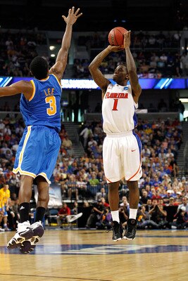 TAMPA, FL - MARCH 19:  Kenny Boynton #1 of the Florida Gators attempts a shot against Malcolm Lee #3 of the UCLA Bruins during the third round of the 2011 NCAA men's basketball tournament at St. Pete Times Forum on March 19, 2011 in Tampa, Florida. Florid
