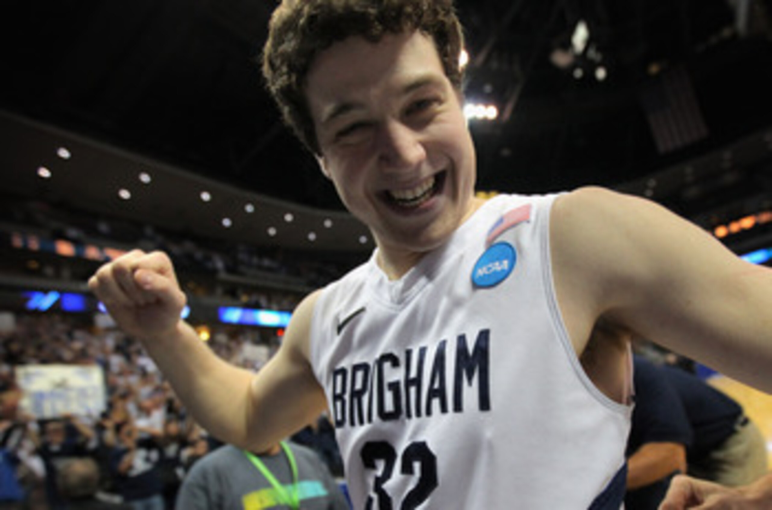 DENVER, CO - MARCH 19:  Jimmer Fredette #32 of the Brigham Young Cougars walks off of the court after defeating the Gonzaga Bulldogs during the third round of the 2011 NCAA men's basketball tournament at Pepsi Center on March 19, 2011 in Denver, Colorado.