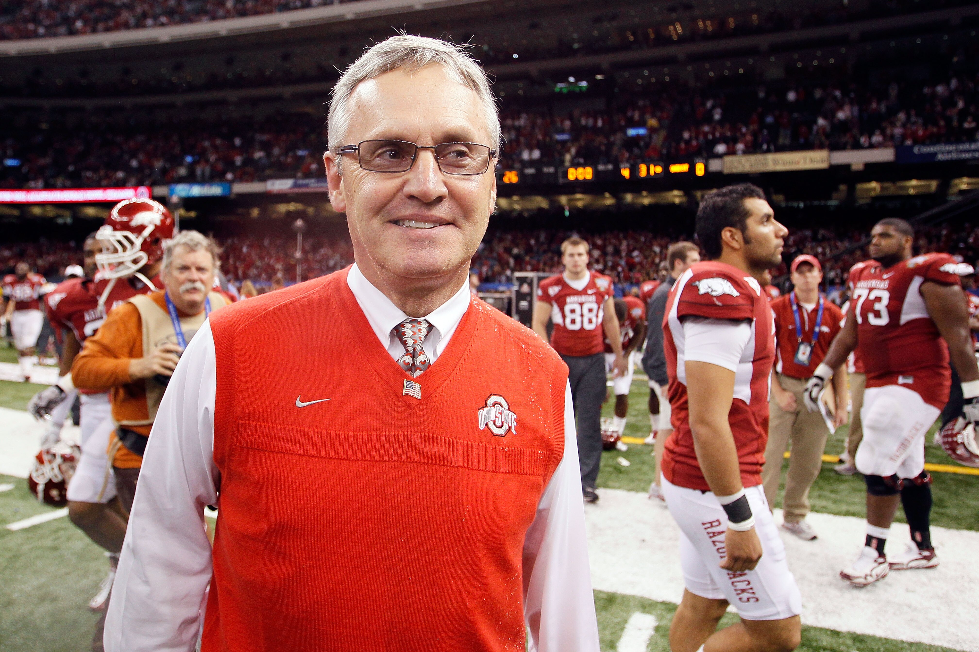 NEW ORLEANS, LA - JANUARY 04: Head coach Jim Tressel of the Ohio State Buckeyes smiles after the Buckeyes 31-26 victory against the Arkansas Razorbacks during the Allstate Sugar Bowl at the Louisiana Superdome on January 4, 2011 in New Orleans, Louisiana NEW ORLEANS, LA - JANUARY 04: Head coach Jim Tressel of the Ohio State Buckeyes smiles after the Buckeyes 31-26 victory against the Arkansas Razorbacks during the Allstate Sugar Bowl at the Louisiana Superdome on January 4, 2011 in New Orleans, Louisiana