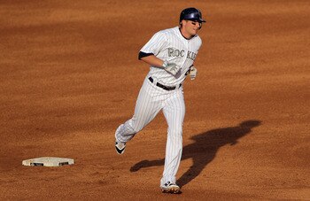 DENVER, CO - JUNE 10:  Troy Tulowitzki #2 of the Colorado Rockies rounds the bases on his solo homerun in the second inning off of starting pitcher Chad Billingsley of the Los Angeles Dodgers at Coors Field on June 10, 2011 in Denver, Colorado.  (Photo by