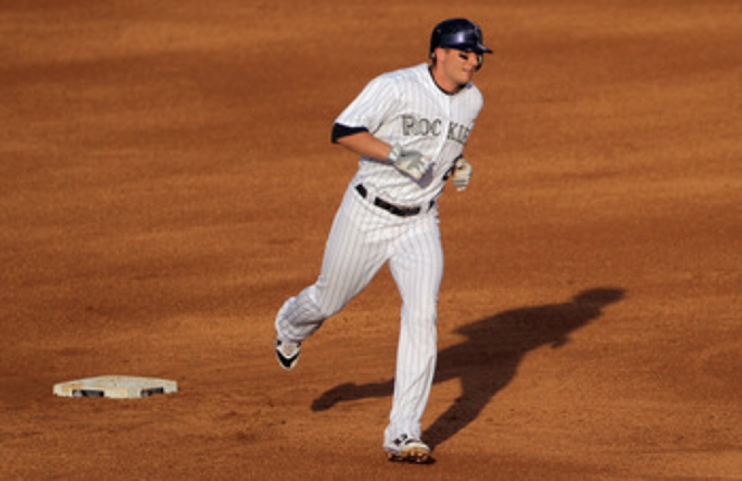 DENVER, CO - JUNE 10:  Troy Tulowitzki #2 of the Colorado Rockies rounds the bases on his solo homerun in the second inning off of starting pitcher Chad Billingsley of the Los Angeles Dodgers at Coors Field on June 10, 2011 in Denver, Colorado.  (Photo by
