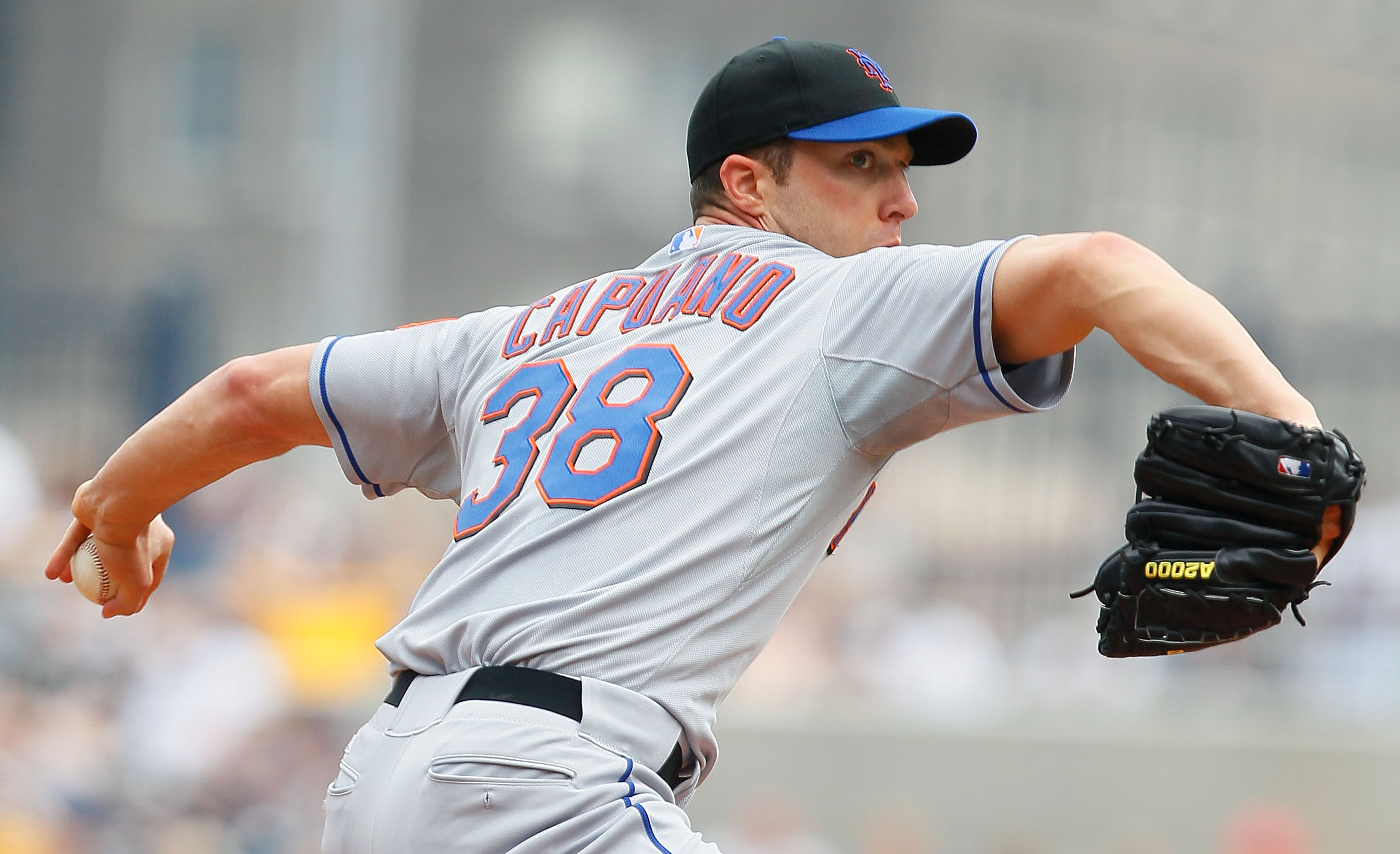 PITTSBURGH - JUNE 12:  Chris Capuano #38 of the New York Mets pitches against the Pittsburgh Pirates during the game on June 12, 2011 at PNC Park in Pittsburgh, Pennsylvania.  (Photo by Jared Wickerham/Getty Images)