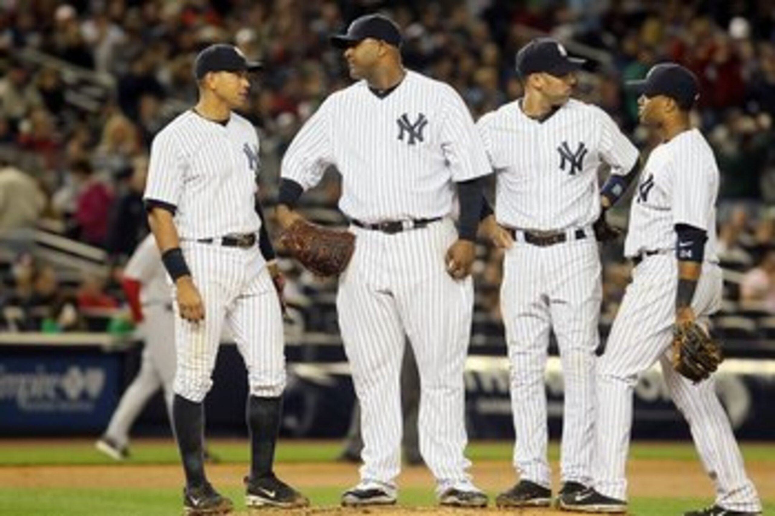 NEW YORK, NY - MAY 14: CC Sabathia #52 (2nd L)of the New York Yankees talks to teammates Derek Jeter #2, Alex Rodriguez #13 (L), and Robinson Cano #24 in the seventh inning after surrendering a three run home run the Boston Red Sox on May 14, 2011 at Yan NEW YORK, NY - MAY 14: CC Sabathia #52 (2nd L)of the New York Yankees talks to teammates Derek Jeter #2, Alex Rodriguez #13 (L), and Robinson Cano #24 in the seventh inning after surrendering a three run home run the Boston Red Sox on May 14, 2011 at Yan
