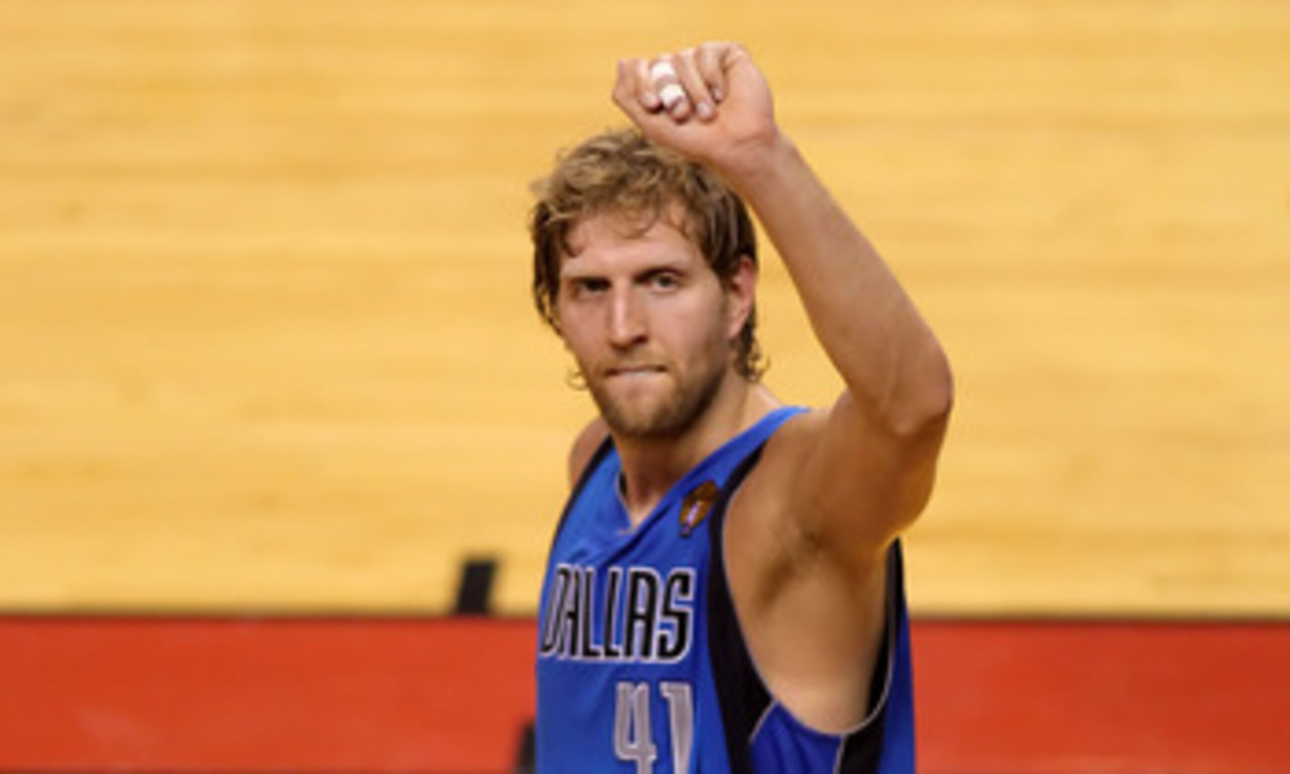 MIAMI, FL - JUNE 12:  (L-R) Finals MVP Dirk Nowitzki #41, Jason Kidd #2, Jason Terry #31 and Shawn Marion #0 of the Dallas Mavericks celebrate with the Larry O'Brien trophy after they won 105-95 against the Miami Heat in Game Six of the 2011 NBA Finals at
