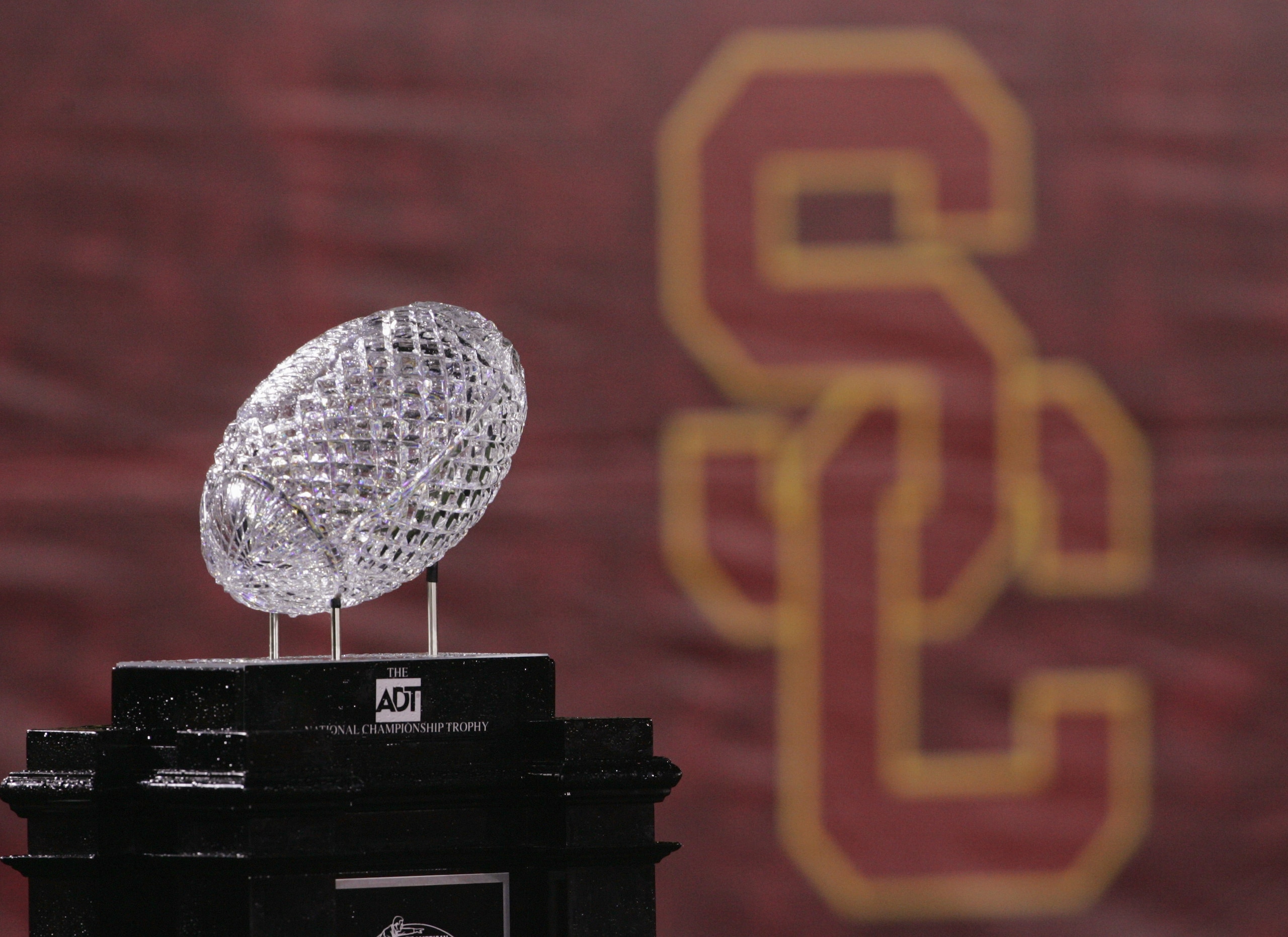 LOS ANGELES - NOVEMBER 27:  The University of Southern California Trojans are awarded the ADT National Championship Trophy after the game against the University of Notre Dame Fighting Irish on November 27, 2004 at the Los Angeles Coliseum in Los Angeles,