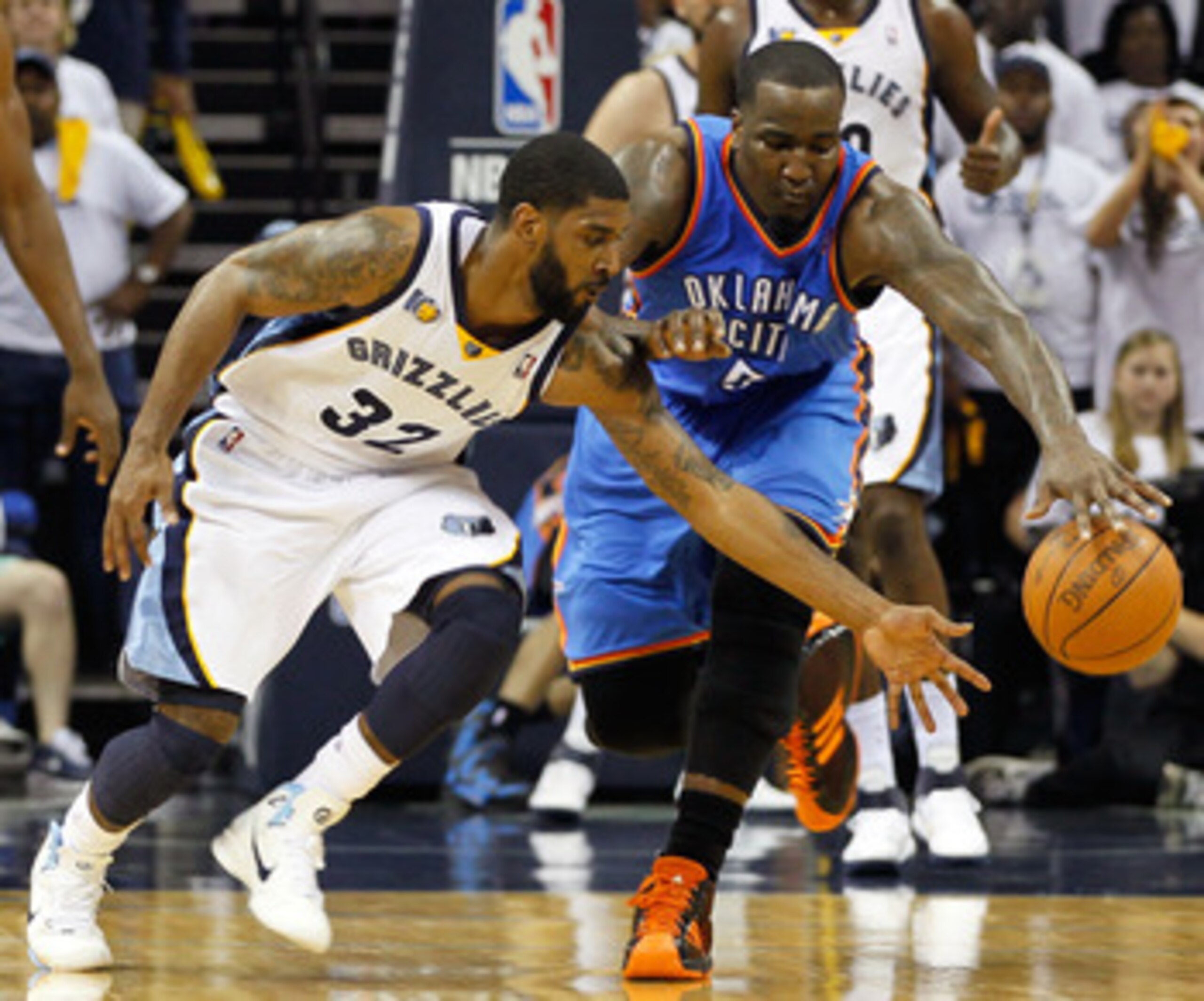 MEMPHIS, TN - MAY 13:  O.J. Mayo #32 of the Memphis Grizzlies battles for a loose ball against Kendrick Perkins #5 of the Oklahoma City Thunder in Game Six of the Western Conference Semifinals in the 2011 NBA Playoffs at FedExForum on May 13, 2011 in Memp