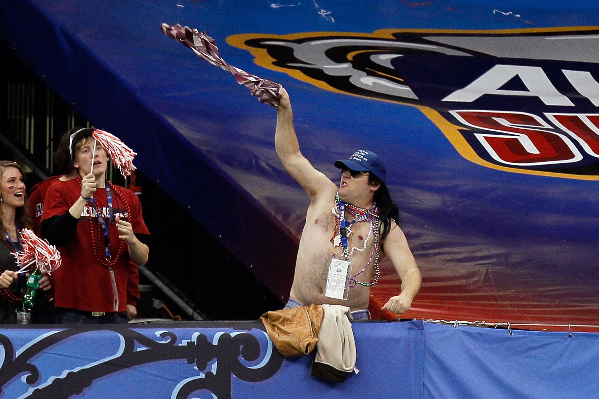 NEW ORLEANS, LA - JANUARY 04: A fan cheers during the Allstate Sugar Bowl between the Arkansas Razorbacks and the Ohio State Buckeyes at the Louisiana Superdome on January 4, 2011 in New Orleans, Louisiana. (Photo by Kevin C. Cox/Getty Images) NEW ORLEANS, LA - JANUARY 04: A fan cheers during the Allstate Sugar Bowl between the Arkansas Razorbacks and the Ohio State Buckeyes at the Louisiana Superdome on January 4, 2011 in New Orleans, Louisiana. (Photo by Kevin C. Cox/Getty Images)