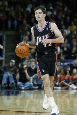 OAKLAND, CA - APRIL 8:  John Stockton #12 of the Utah Jazz drives during the game against the Golden State Warriors at The Arena in Oakland on April 8, 2003 in Oakland, California.  The Warriors won 128-102.  NOTE TO USER: User expressly acknowledges and