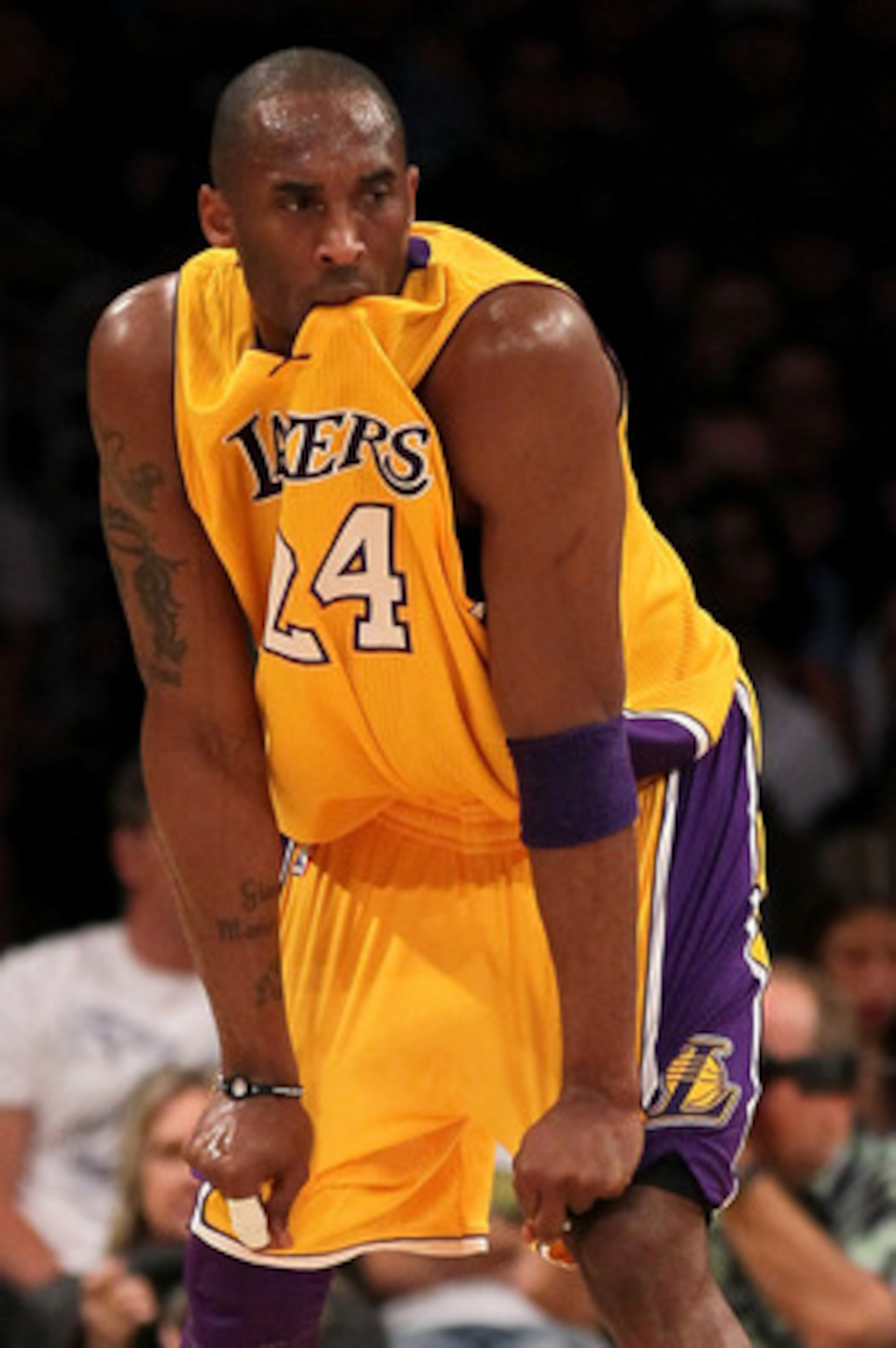 LOS ANGELES, CA - MAY 04:  Kobe Bryant #24 of the Los Angeles Lakers bites his jersey while taking on the Dallas Mavericks in the first quarter in Game Two of the Western Conference Semifinals in the 2011 NBA Playoffs at Staples Center on May 4, 2011 in L