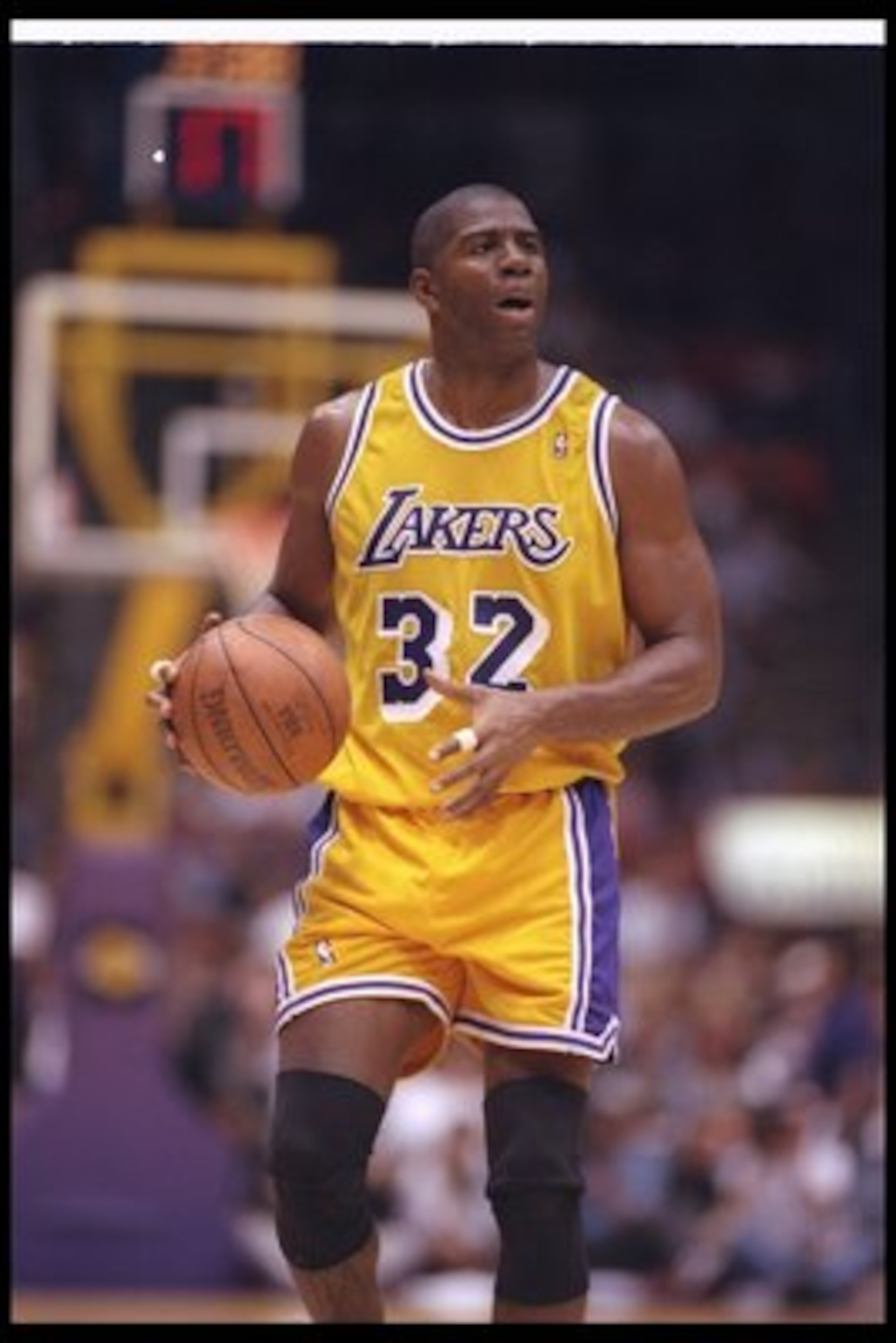 2 Feb 1996:  Guard Earvin (Magic) Johnson of the Los Angeles Lakers moves the ball during a game against the Chicago Bulls at the Great Western Forum in Inglewood, California.  The Bulls won the game, 99-84. Mandatory Credit: ALLSPORT USA  /Allsport Manda