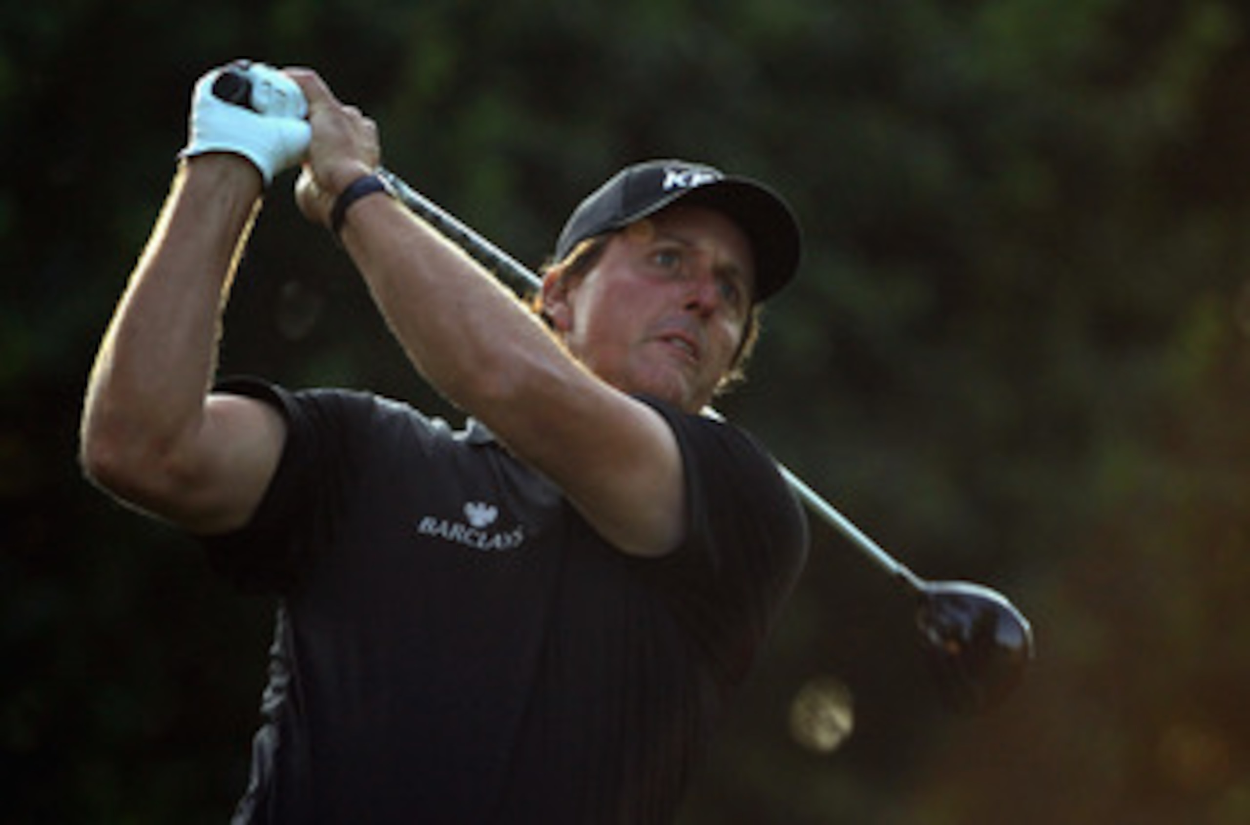 CHARLOTTE, NC - MAY 06:  Phil Mickelson watches his tee shot on the 11th hole during the second round of the Wells Fargo Championship at Quail Hollow Club on May 6, 2011 in Charlotte, North Carolina.  (Photo by Streeter Lecka/Getty Images)