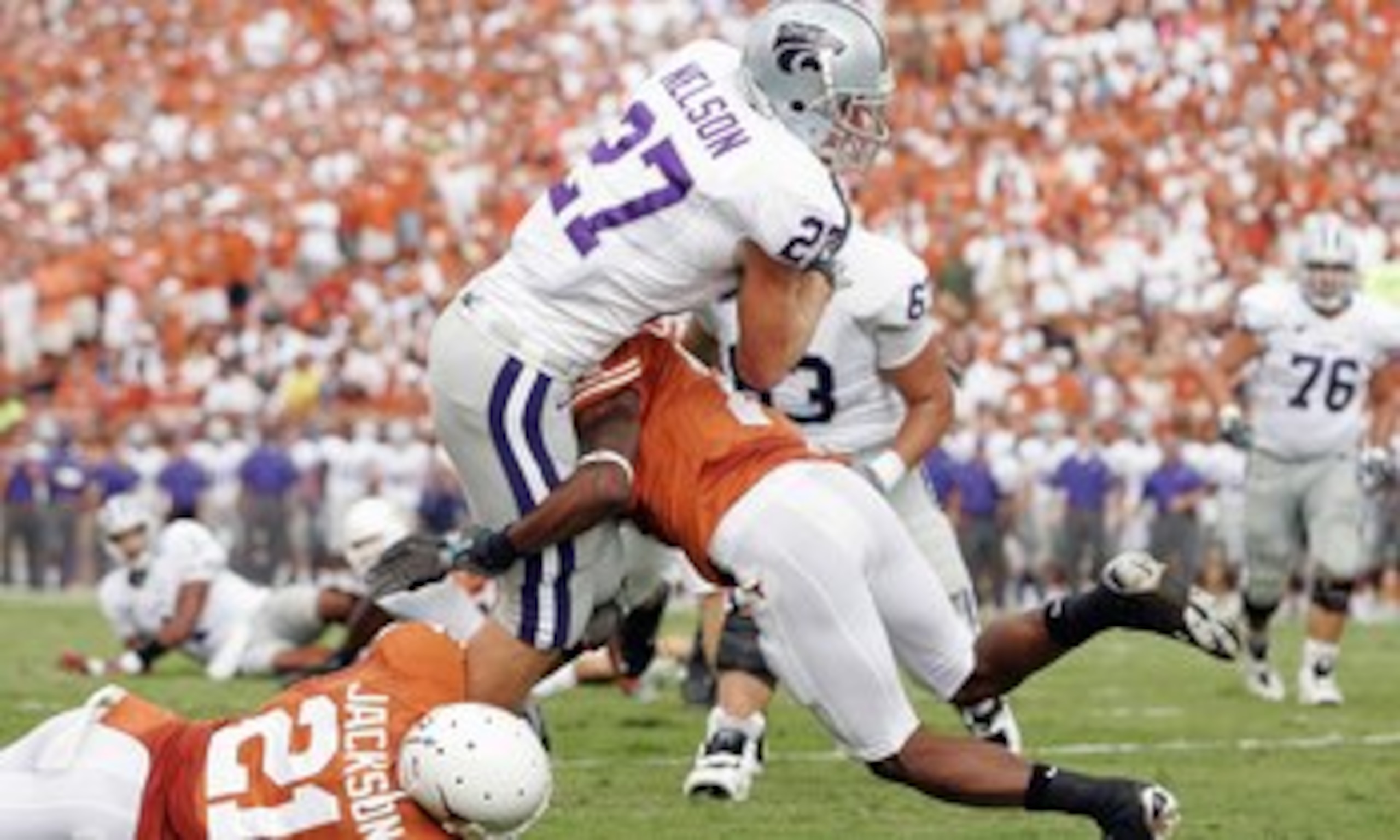 AUSTIN, TX - SEPTEMBER 29: Jordy Nelson #27 of the Kansas State Wildcats leaps for the endzone during the game against the Texas Longhorns on September 29, 2007 at Darrell K Royal-Texas Memorial Stadium in Austin, Texas.  Kansas State won 41-21.  (Photo b