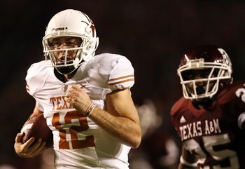 COLLEGE STATION, TX - NOVEMBER 26: Quarterback Colt McCoy #12 of the Texas Longhorns scrambles away from the Texas A&M Aggies defense to score a touchdown in the first half at Kyle Field on November 26, 2009 in College Station, Texas. he Longhorns defeate COLLEGE STATION, TX - NOVEMBER 26: Quarterback Colt McCoy #12 of the Texas Longhorns scrambles away from the Texas A&M Aggies defense to score a touchdown in the first half at Kyle Field on November 26, 2009 in College Station, Texas. he Longhorns defeate