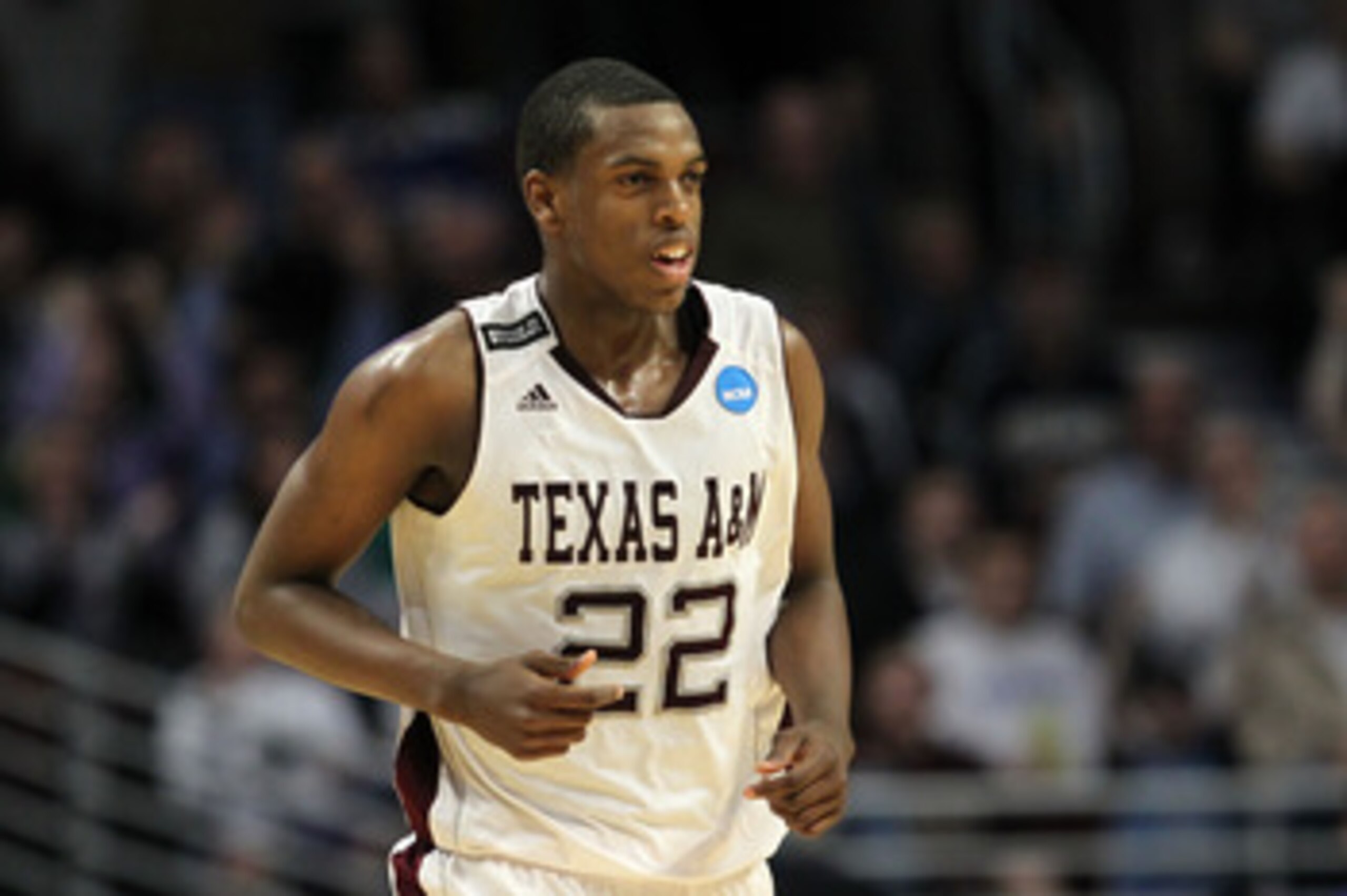 CHICAGO, IL - MARCH 18:  Khris Middleton #22 of the Texas A&M Aggies smiles after making a three-pointer at the buzzer in the first half of the game against the Florida State Seminoles during the second round of the 2011 NCAA men's basketball tournament a