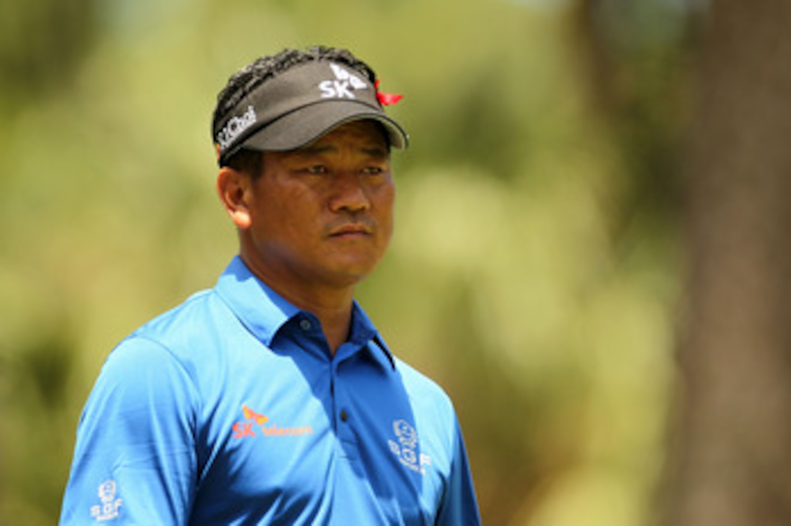 PONTE VEDRA BEACH, FL - MAY 15:  K.J. Choi of South Korea looks on from the second tee during the final round of THE PLAYERS Championship held at THE PLAYERS Stadium course at TPC Sawgrass on May 15, 2011 in Ponte Vedra Beach, Florida.  (Photo by Mike Ehr