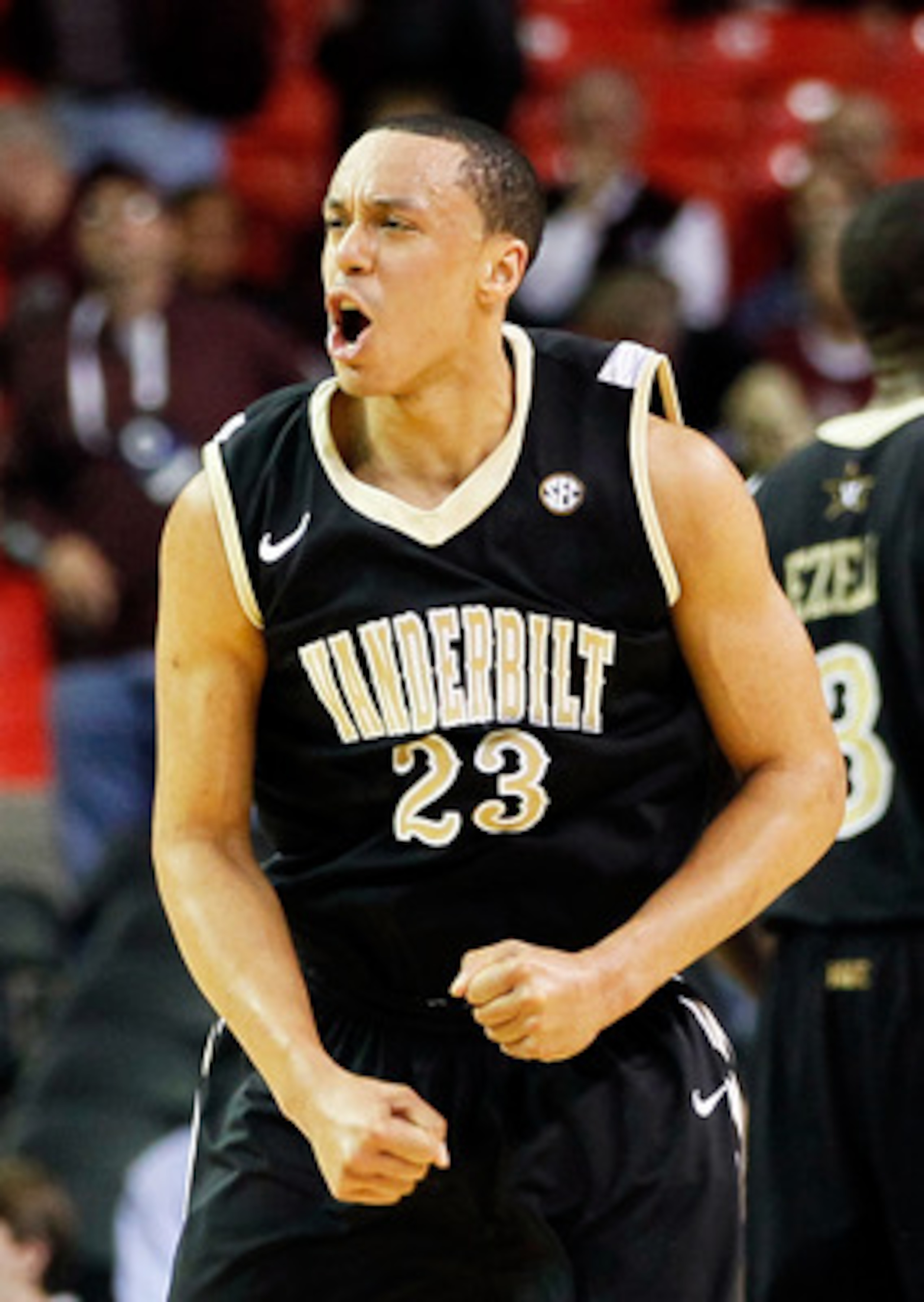 ATLANTA, GA - MARCH 11:  John Jenkins #23 of the Vanderbilt Commodores celebrates their win over the Mississippi State Bulldogs during the quarterfinals of the SEC Men's Basketball Tournament at Georgia Dome on March 11, 2011 in Atlanta, Georgia. The Comm