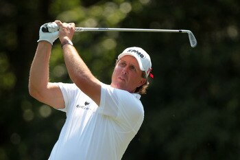 PONTE VEDRA BEACH, FL - MAY 12:  Phil Mickelson hits his tee shot on the eighth hole during the first round of THE PLAYERS Championship held at THE PLAYERS Stadium course at TPC Sawgrass on May 12, 2011 in Ponte Vedra Beach, Florida.  (Photo by Scott Hall