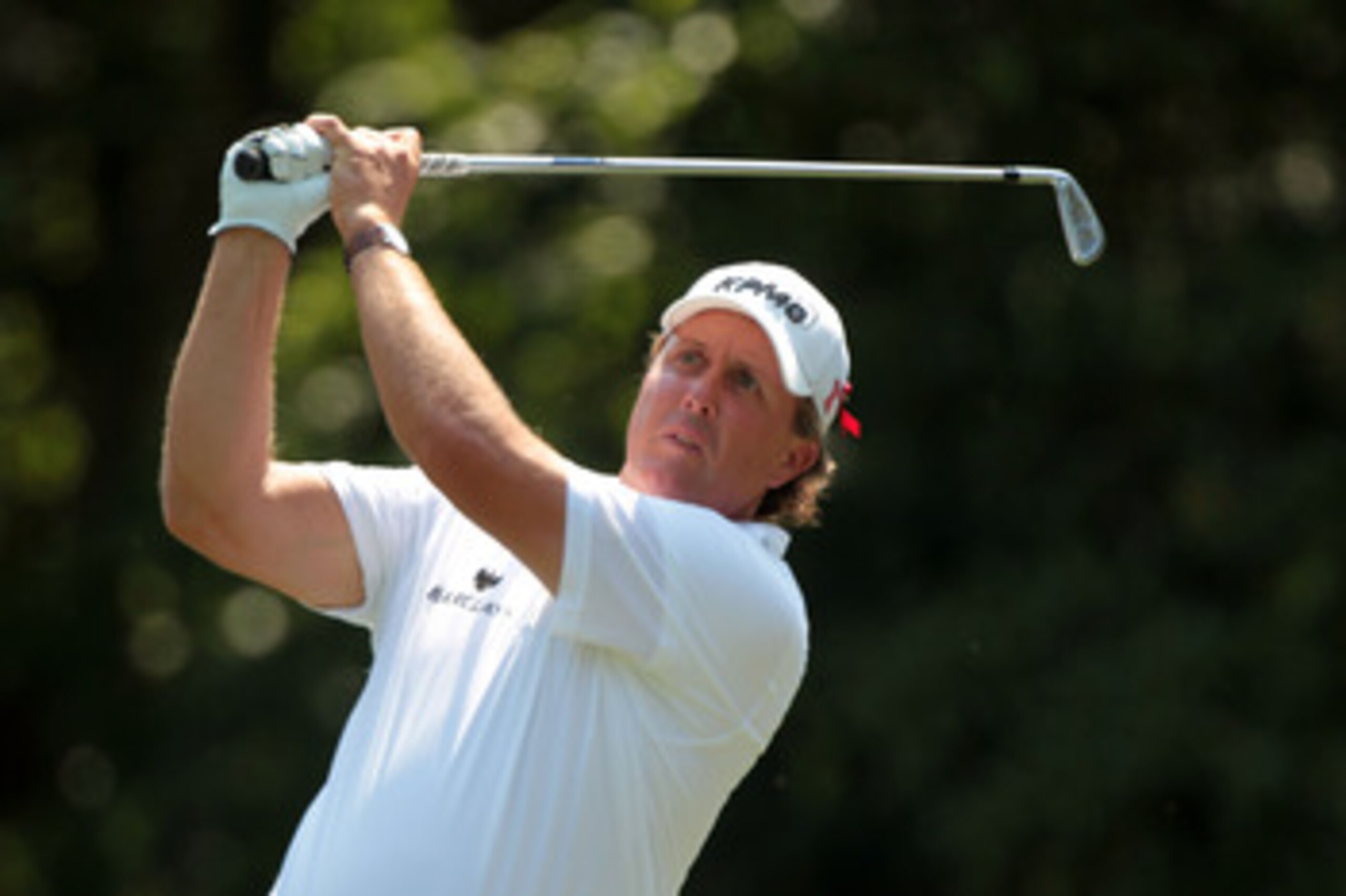 PONTE VEDRA BEACH, FL - MAY 12:  Phil Mickelson hits his tee shot on the eighth hole during the first round of THE PLAYERS Championship held at THE PLAYERS Stadium course at TPC Sawgrass on May 12, 2011 in Ponte Vedra Beach, Florida.  (Photo by Scott Hall