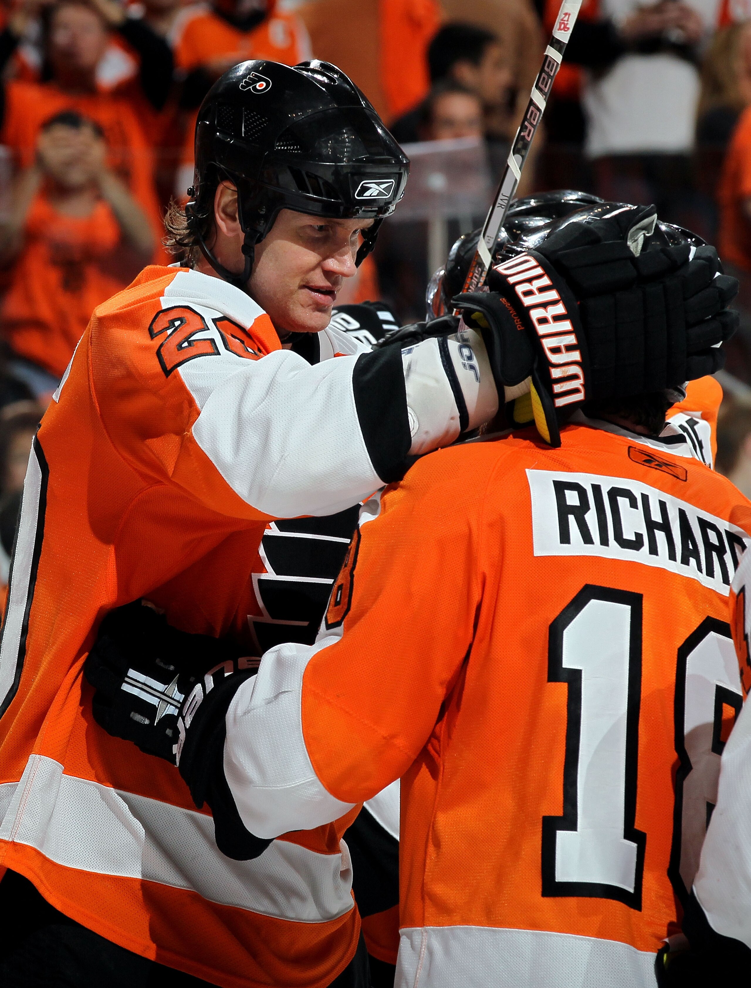 PHILADELPHIA - MAY 24:  Chris Pronger #20 and Mike Richards #18 of the Philadelphia Flyers celebrate after defeating the Montreal Canadiens by a score of 4-2 to win Game 5 of the Eastern Conference Finals and to advance to the 2010 NHL Stanley Cup Finals 