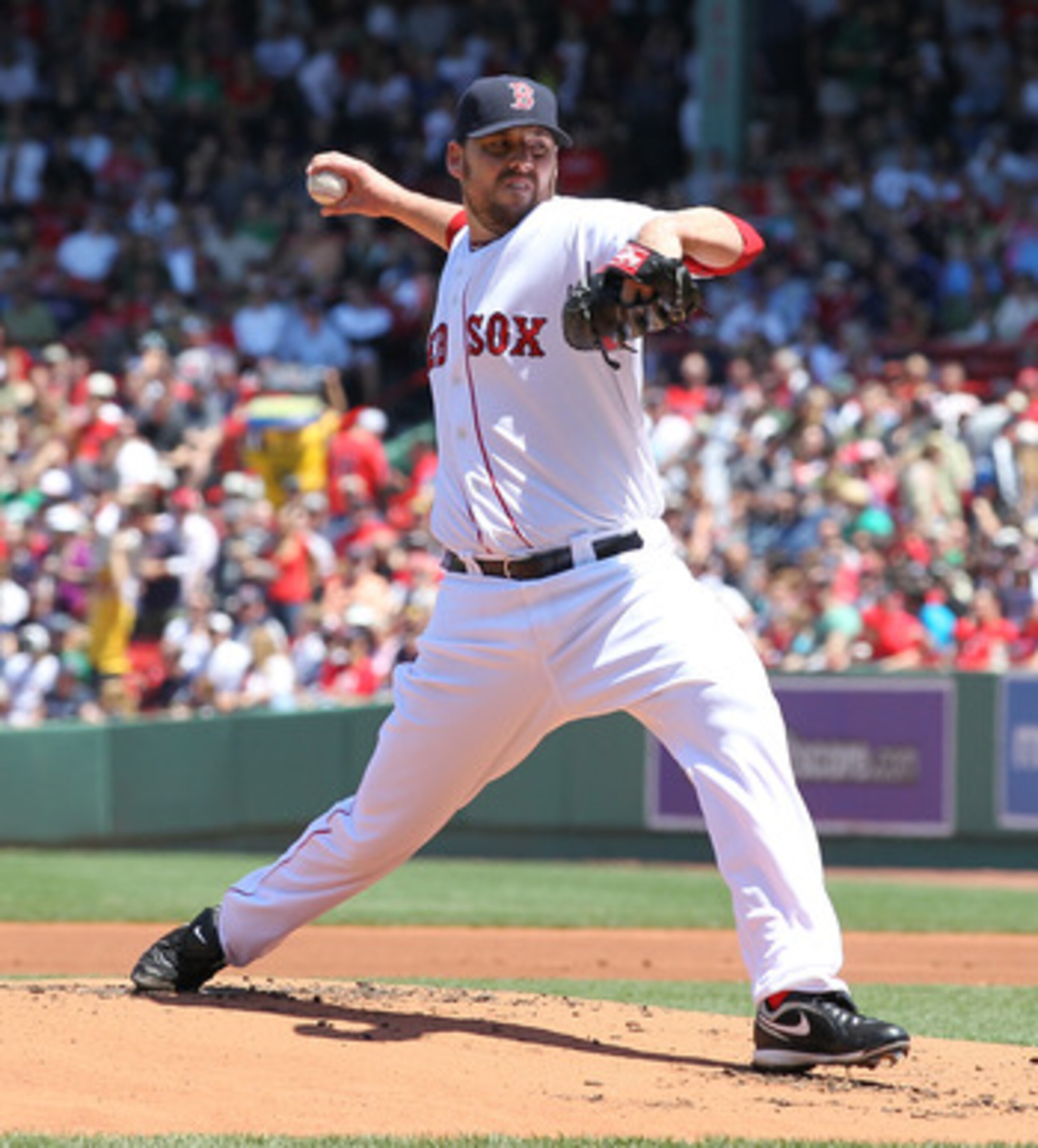 BOSTON, MA - JUNE 5:  John Lackey #41 of the Boston Red Sox throws against the Oakland Athletics at Fenway Park on June 5, 2011 in Boston, Massachusetts.  (Photo by Jim Rogash/Getty Images)