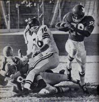 AFL MVP Abner Haynes of the Texans gains yardage in a mostly empty stadium