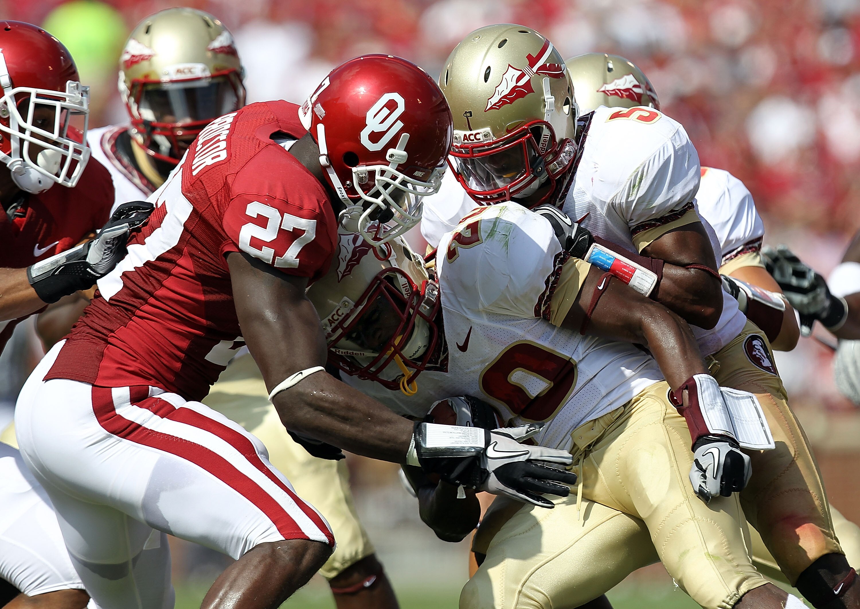 NORMAN, OK - SEPTEMBER 11: Lamarcus Joyner #20 of the Florida State Seminoles returns a kick against Sam Proctor #27 of the Oklahoma Sooners at Gaylord Family Oklahoma Memorial Stadium on September 11, 2010 in Norman, Oklahoma. (Photo by Ronald Martinez NORMAN, OK - SEPTEMBER 11: Lamarcus Joyner #20 of the Florida State Seminoles returns a kick against Sam Proctor #27 of the Oklahoma Sooners at Gaylord Family Oklahoma Memorial Stadium on September 11, 2010 in Norman, Oklahoma. (Photo by Ronald Martinez