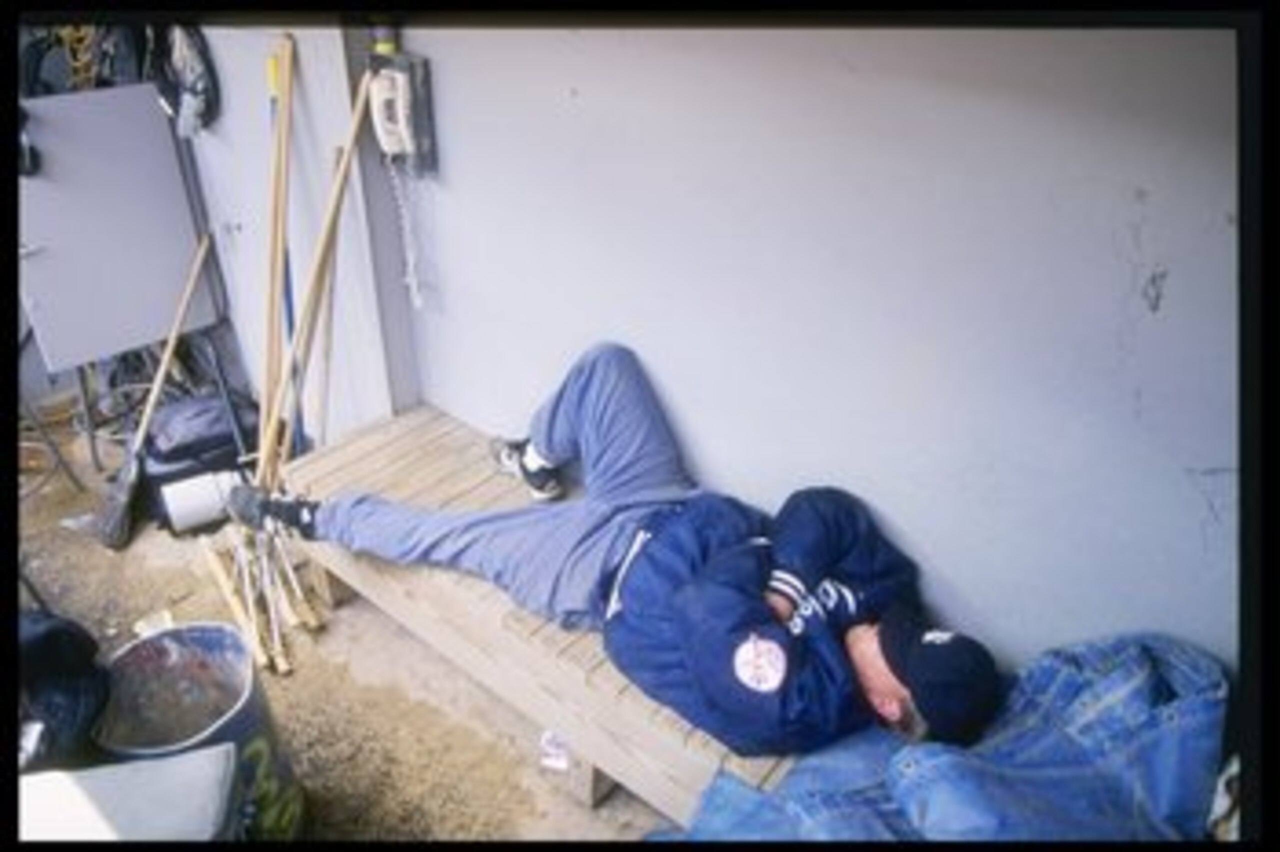 10 May 1997:  Groundskeeper takes a nap during game between the New York Yankees and the Kansas City Royals at Yankee Stadium in the Bronx, New York.  The Yankees won the game 3-2. Mandatory Credit: Al Bello  /Allsport