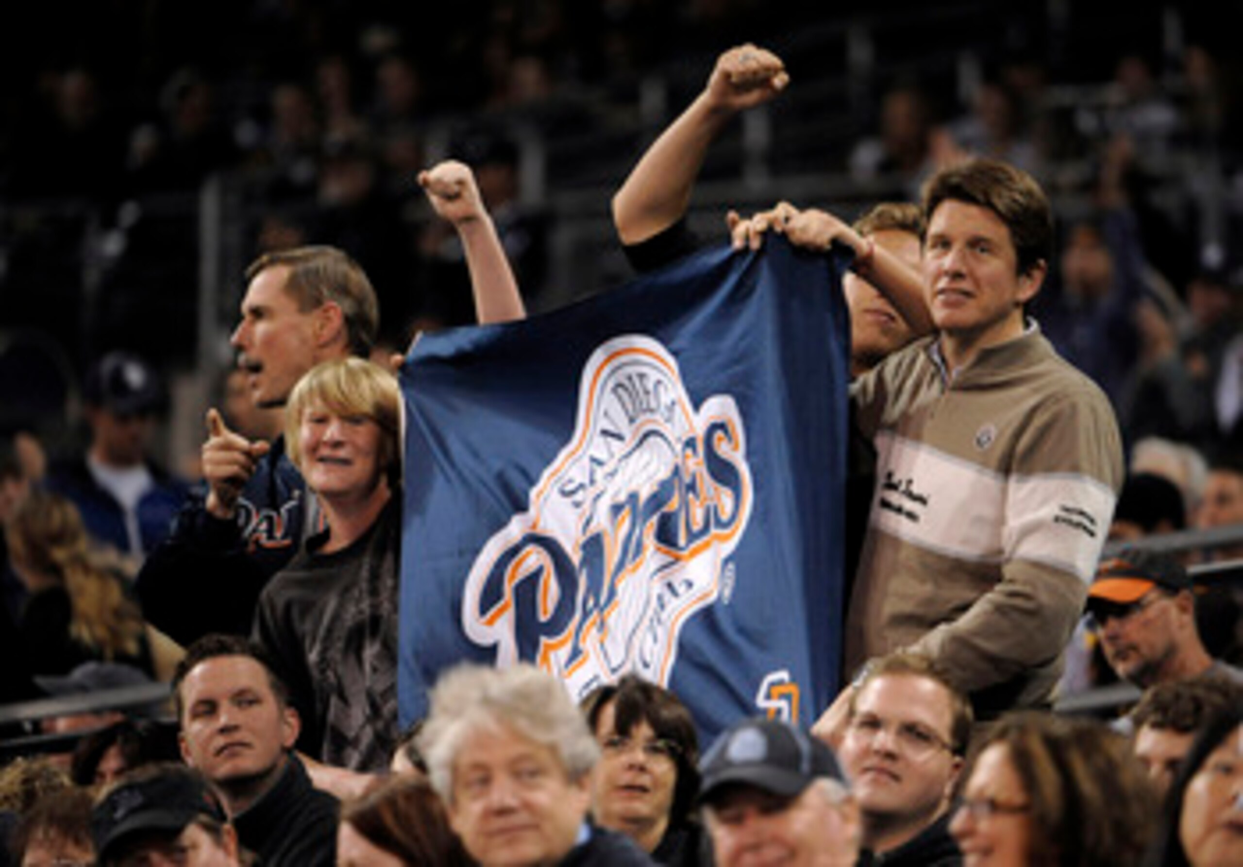 SAN DIEGO, CA - JUNE 10:  San Diego Padres fans hold up a banner during the eighth inning of a baseball game against the Washington Nationals at Petco Park on June 10, 2011 in San Diego, California.  The Nationals won 2-1.  (Photo by Denis Poroy/Getty Ima