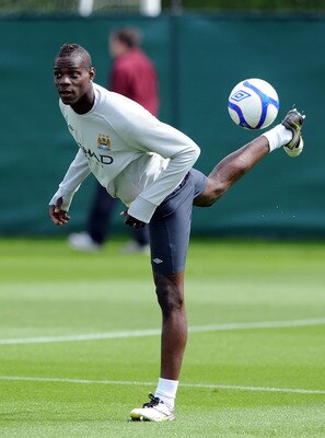 MANCHESTER, ENGLAND - MAY 12:  Mario Balotelli of Manchester City in action during a training session at Carrington Training Ground on May 12, 2011 in Manchester, England.  (Photo by Chris Brunskill/Getty Images)