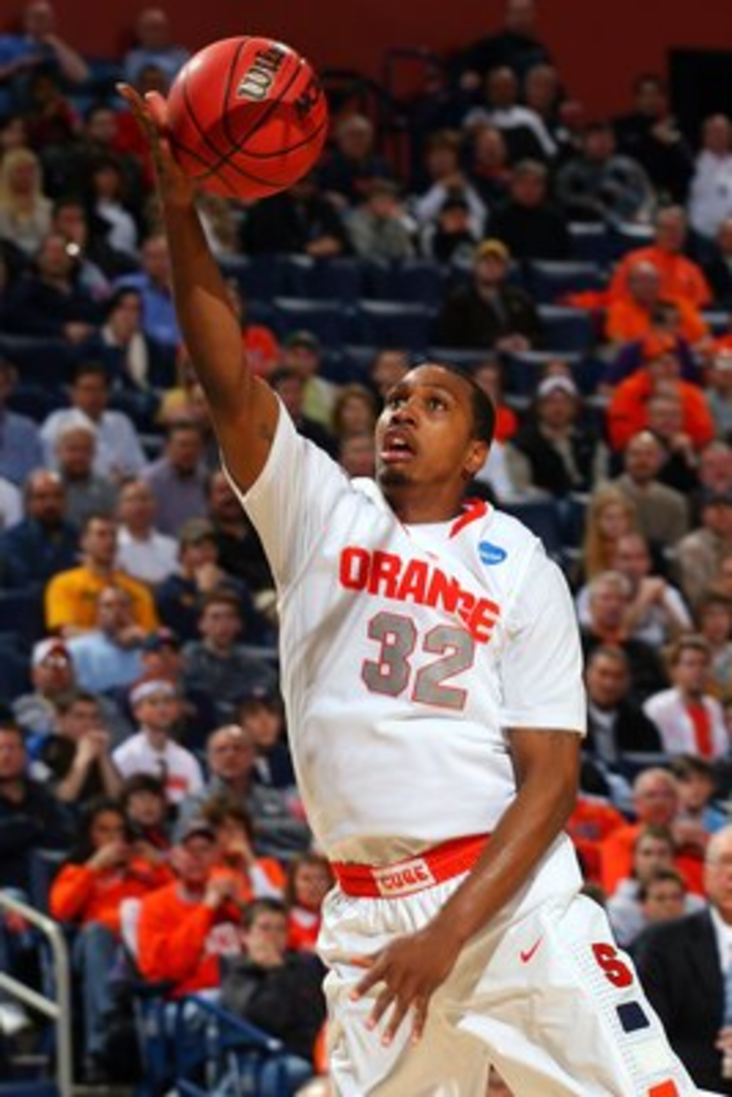 BUFFALO, NY - MARCH 19:  Kris Joseph #32 of the Syracuse Orange goes to the hoop against the Vermont Catamounts during the first round of the 2010 NCAA men's basketball tournament at HSBC Arena on March 19, 2010 in Buffalo, New York.  (Photo by Rick Stewa