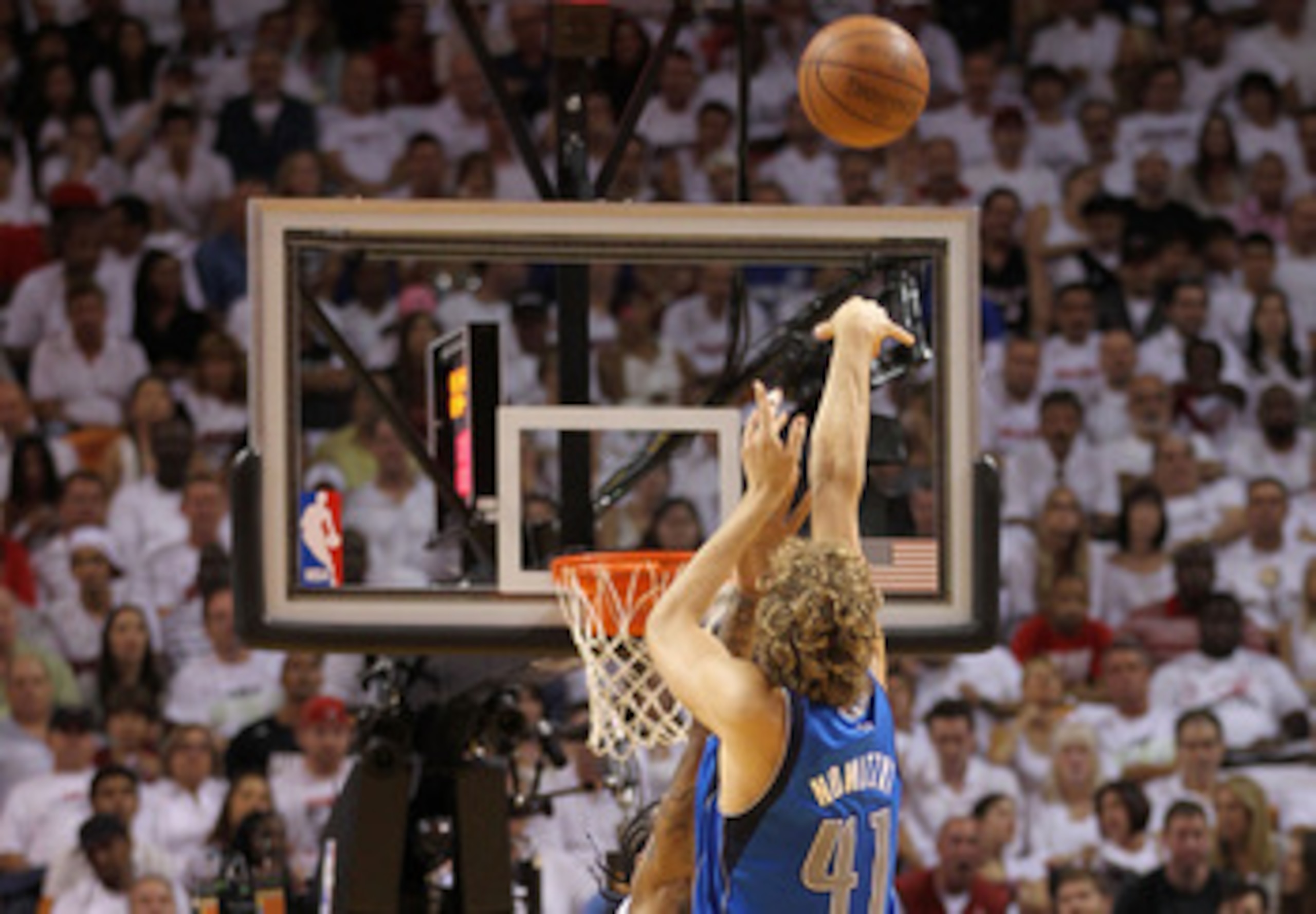 MIAMI, FL - JUNE 12:  Dirk Nowitzki #41 of the Dallas Mavericks attempts a shot against the Miami Heat in Game Six of the 2011 NBA Finals at American Airlines Arena on June 12, 2011 in Miami, Florida. NOTE TO USER: User expressly acknowledges and agrees t