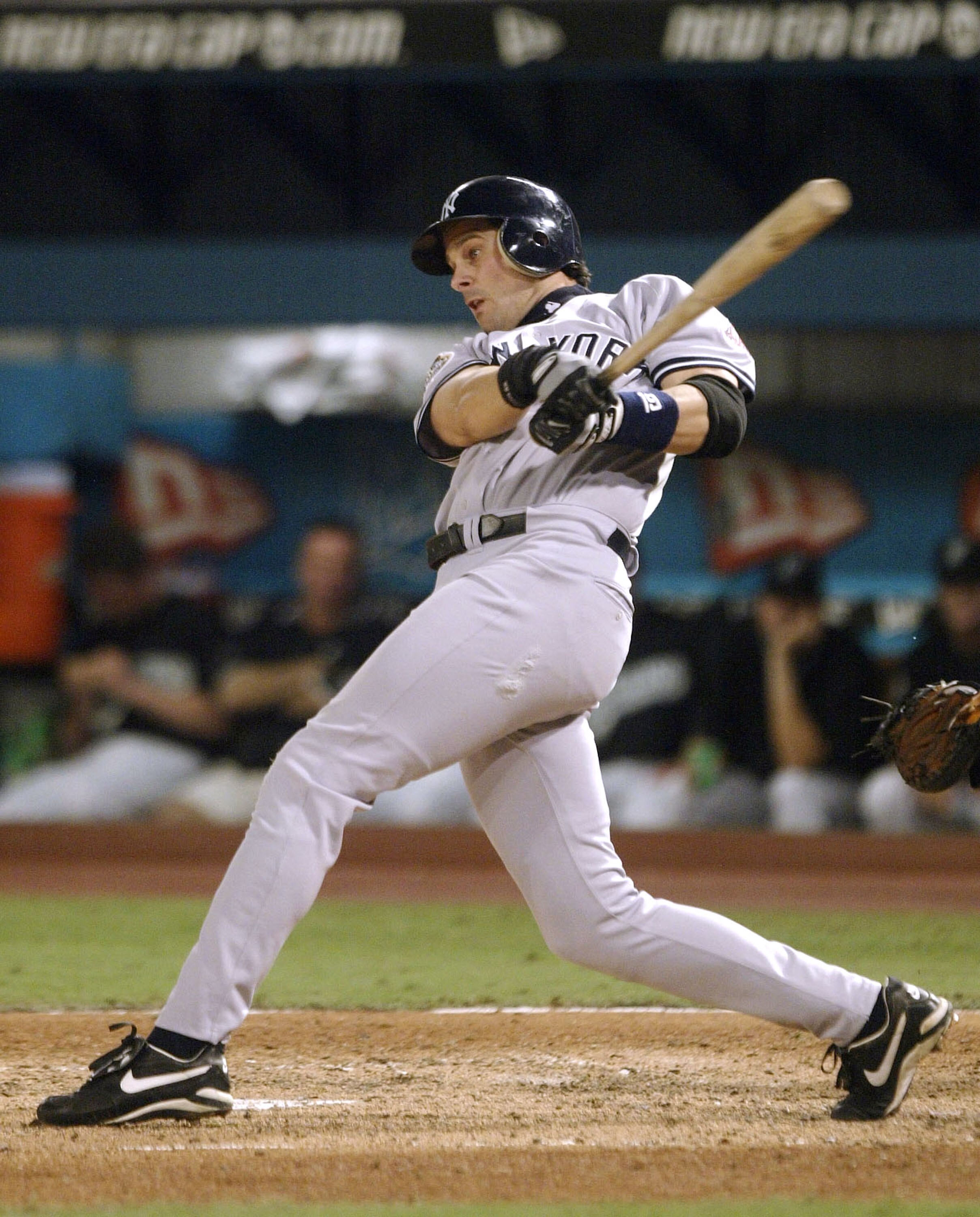 MIAMI - OCTOBER 22:  Aaron Boone #19 of the New York Yankees hits an RBI single in the second inning against the Florida Marlins during game four of the Major League Baseball World Series October 22, 2003 at Pro Player Stadium in Miami, Florida.  (Photo b