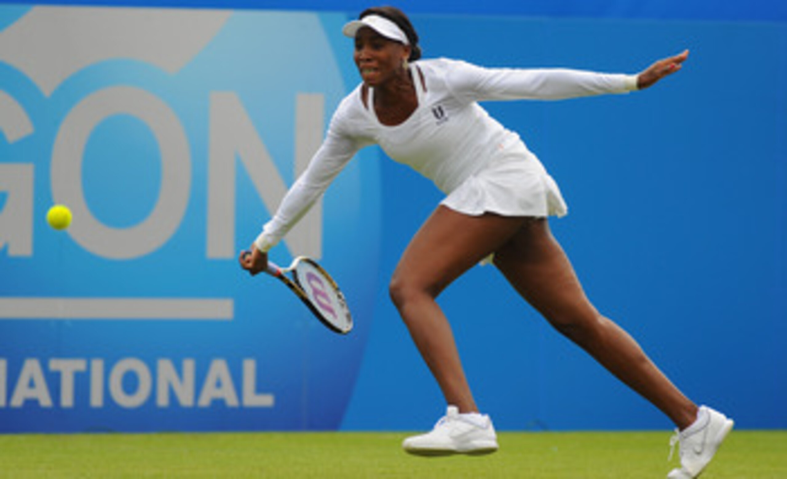 EASTBOURNE, ENGLAND - JUNE 13:  Venus Williams of USA plays a forehand in her match against Andrea Petkovic of Germany during Day Three of the AEGON International at Devonshire Park on June 13, 2011 in Eastbourne, England.  (Photo by Mike Hewitt/Getty Ima