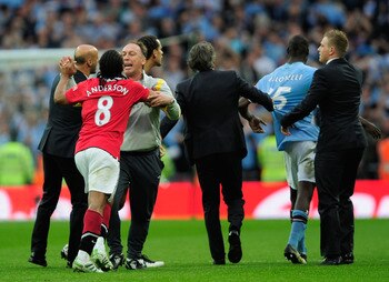 LONDON, ENGLAND - APRIL 16:  Attilio Lombardo and David Platt of Man City clashes with Anderson of Man  Utd at the final whistle during the FA Cup sponsored by E.ON semi final match between Manchester City and Manchester United at Wembley Stadium on April