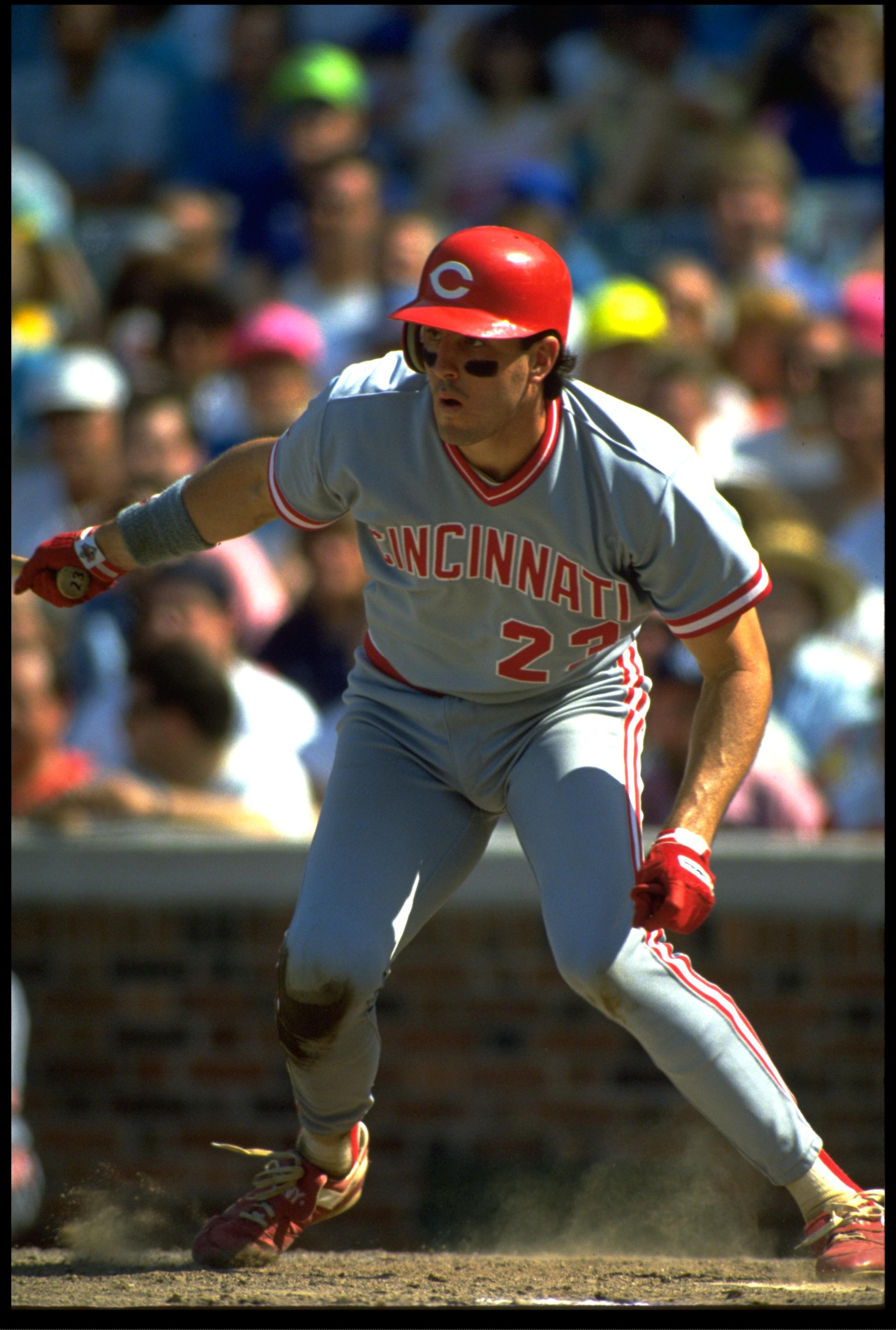 1991:  CINCINNATI REDS BATTER HAL MORRIS RUNS TO FIRST BASE AFTER MAKING CONTACT WITH A PITCH, DURING THE REDS VERSUS CHICAGO CUBS GAME AT WRIGLY FIELD IN CHICAGO, ILLINOIS.